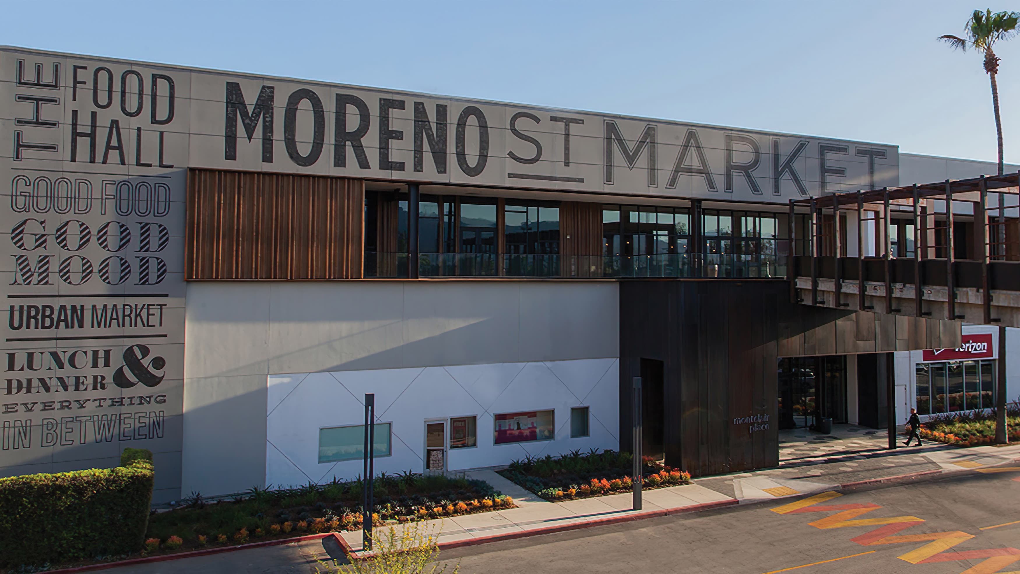 Moreno Street Market building with architectural graphics and specialty crosswalk