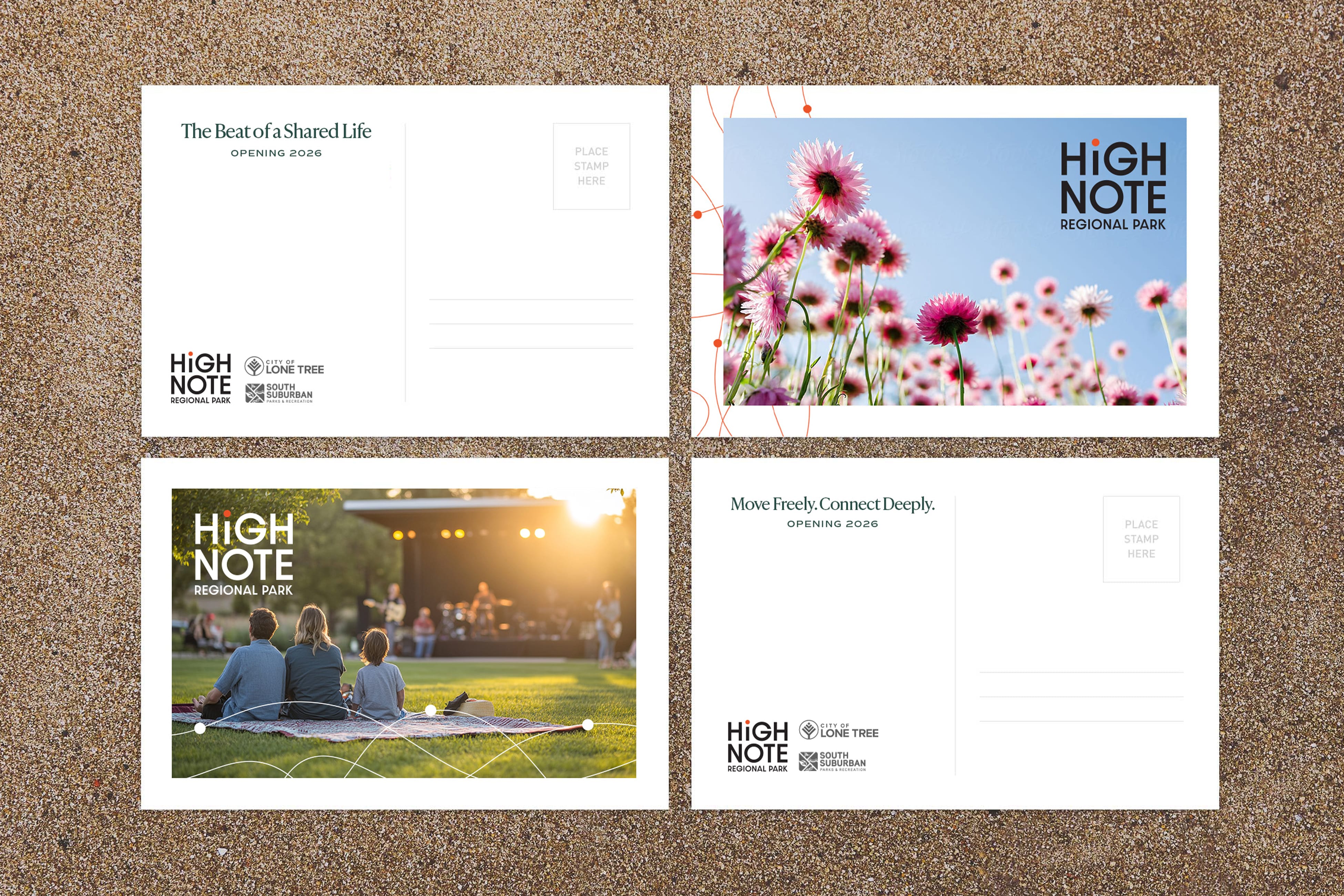 Four HighNote Regional Park postcards on a speckled stone surface, two backs reading "The Beat of a Shared Life" and "Move Freely. Connect Deeply." with "Opening 2026" and partner logos, and two fronts showing wildflowers against a blue sky and a family watching an outdoor concert at sunset — collateral design by RSM Design.
