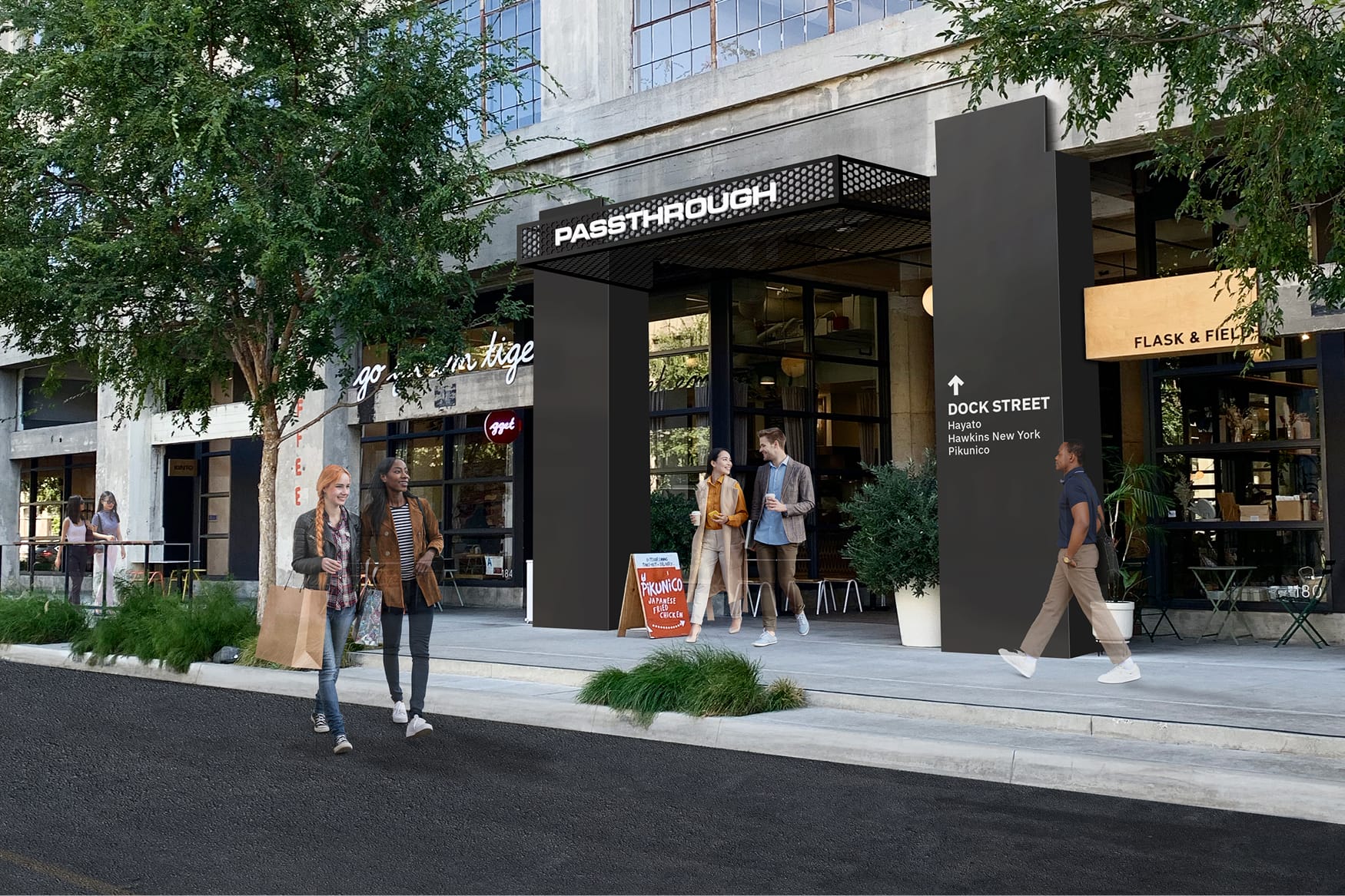 Storefront entry sign reading "Passthrough" and Dock Street directional pylon with tenant listings at ROW DTLA - wayfinding and environmental graphic design by RSM Design