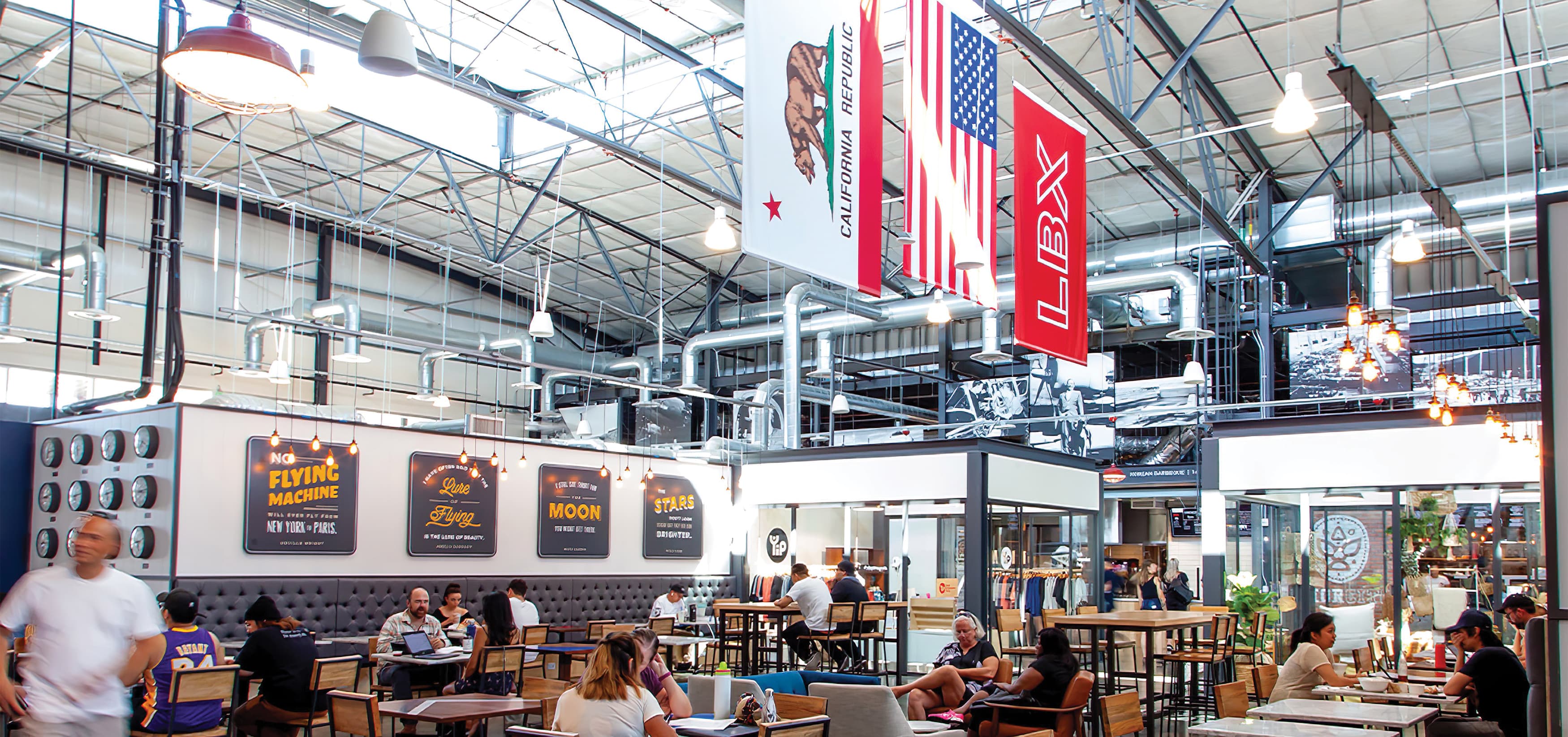 The Hangar, a food hall dining complex at Long Beach Exchange. Environmental Graphic Design.
