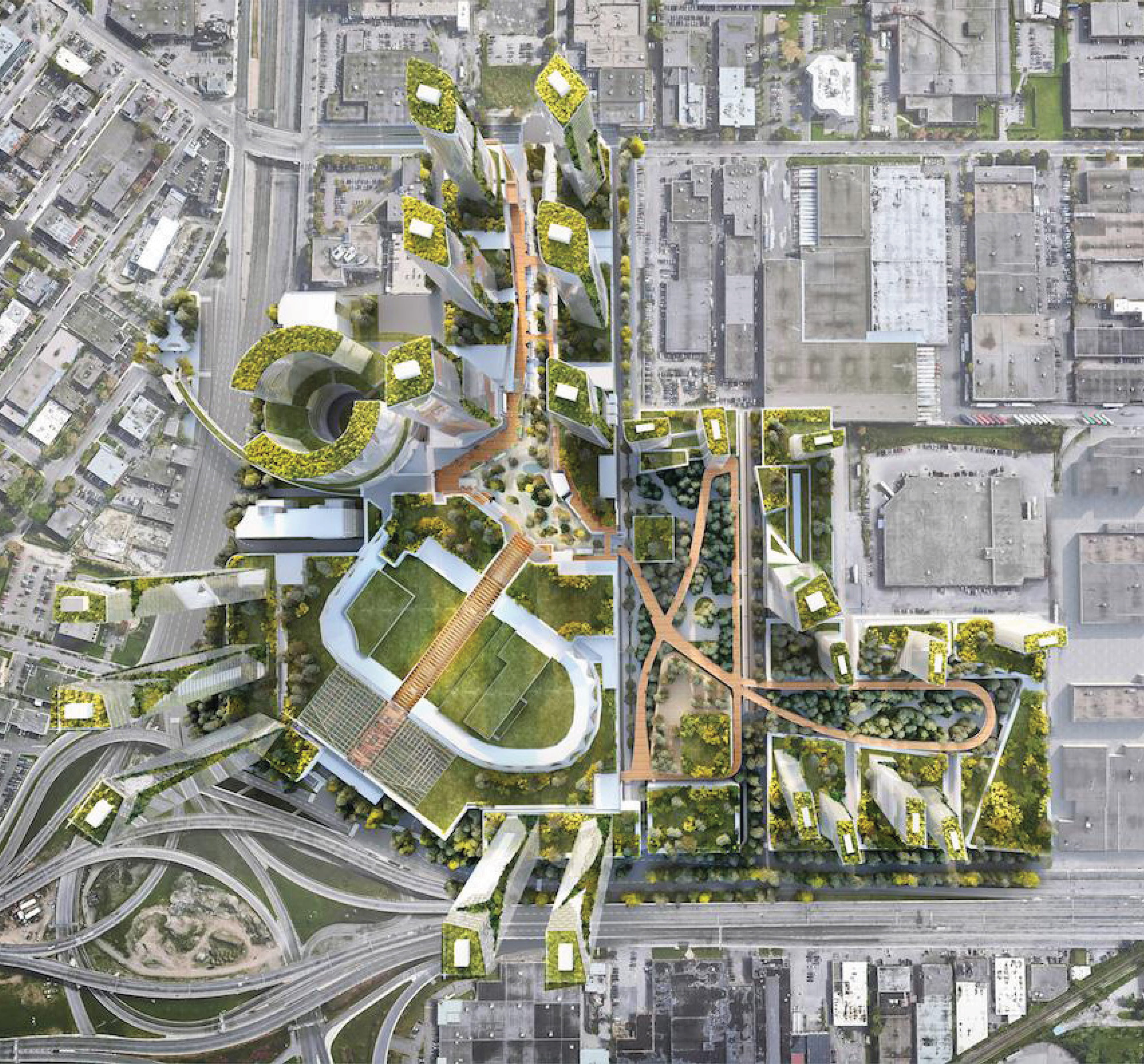 An aerial master plan rendering of the Royalmount development showing the full site footprint with lush green rooftops, a continuous copper-toned pedestrian pathway weaving through interconnected retail, hospitality, and mixed-use buildings, landscaped plazas, a central lawn, and surrounding urban street grid — illustrating RSM Design's placemaking, wayfinding and signage design, and environmental graphic design services applied at a district scale within the mixed-use, retail, and international markets