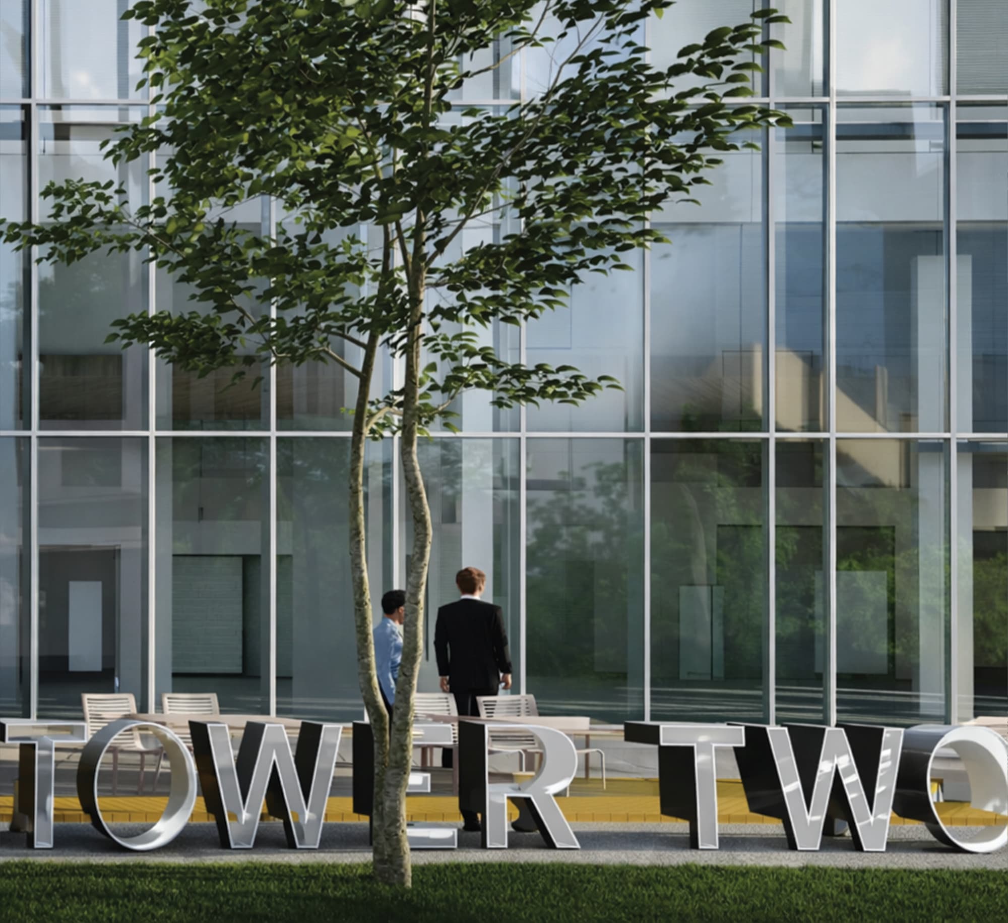 Architectural rendering of large-scale dimensional "Tower Two" ground-level monument lettering at a glass office building entrance with pedestrians and street trees, showcasing placemaking, experiential graphics, and building identification signage for a mixed-use workplace development by RSM Design.
