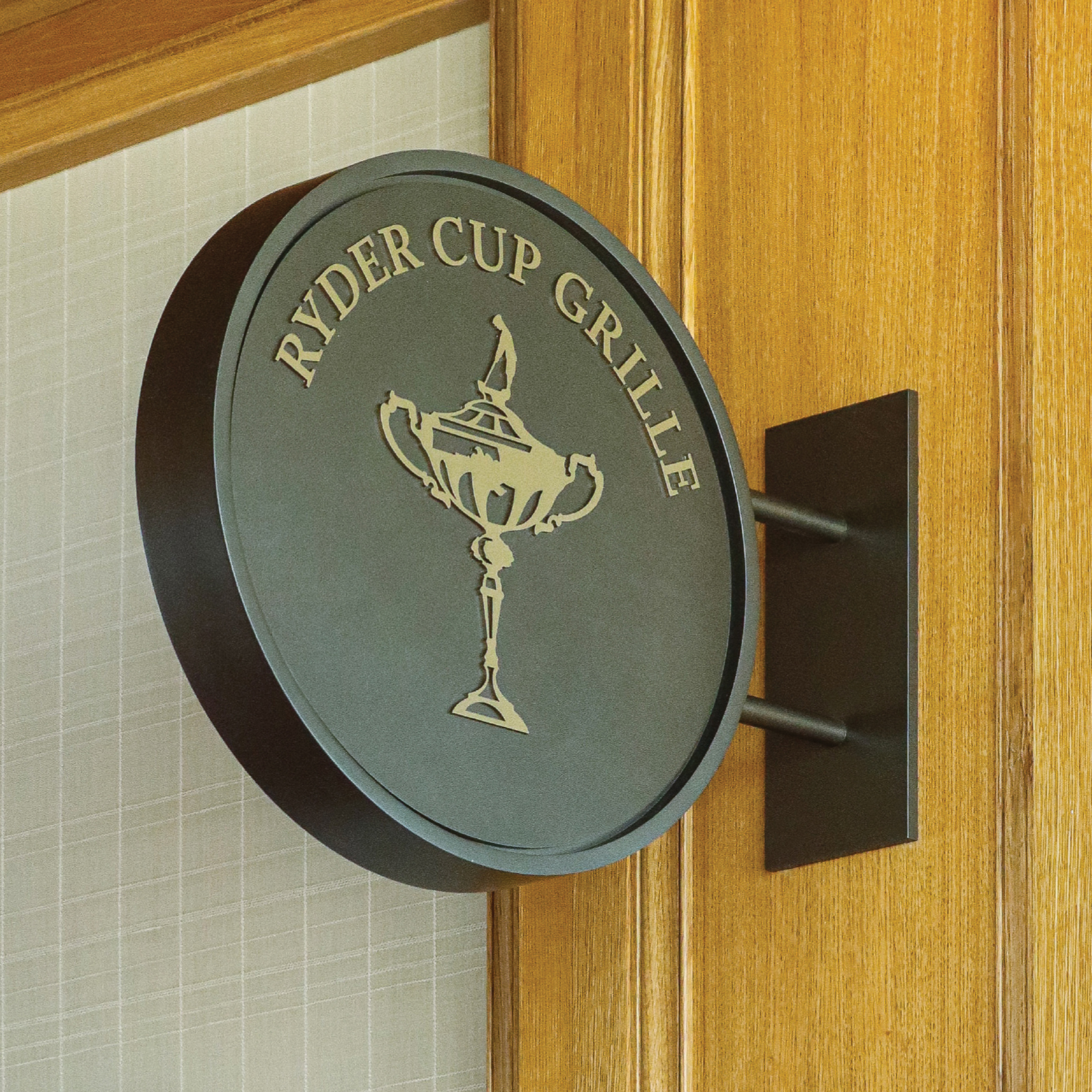 Image of the Ryder Cup Grille signage at the Omni PGA Frisco Resort. 