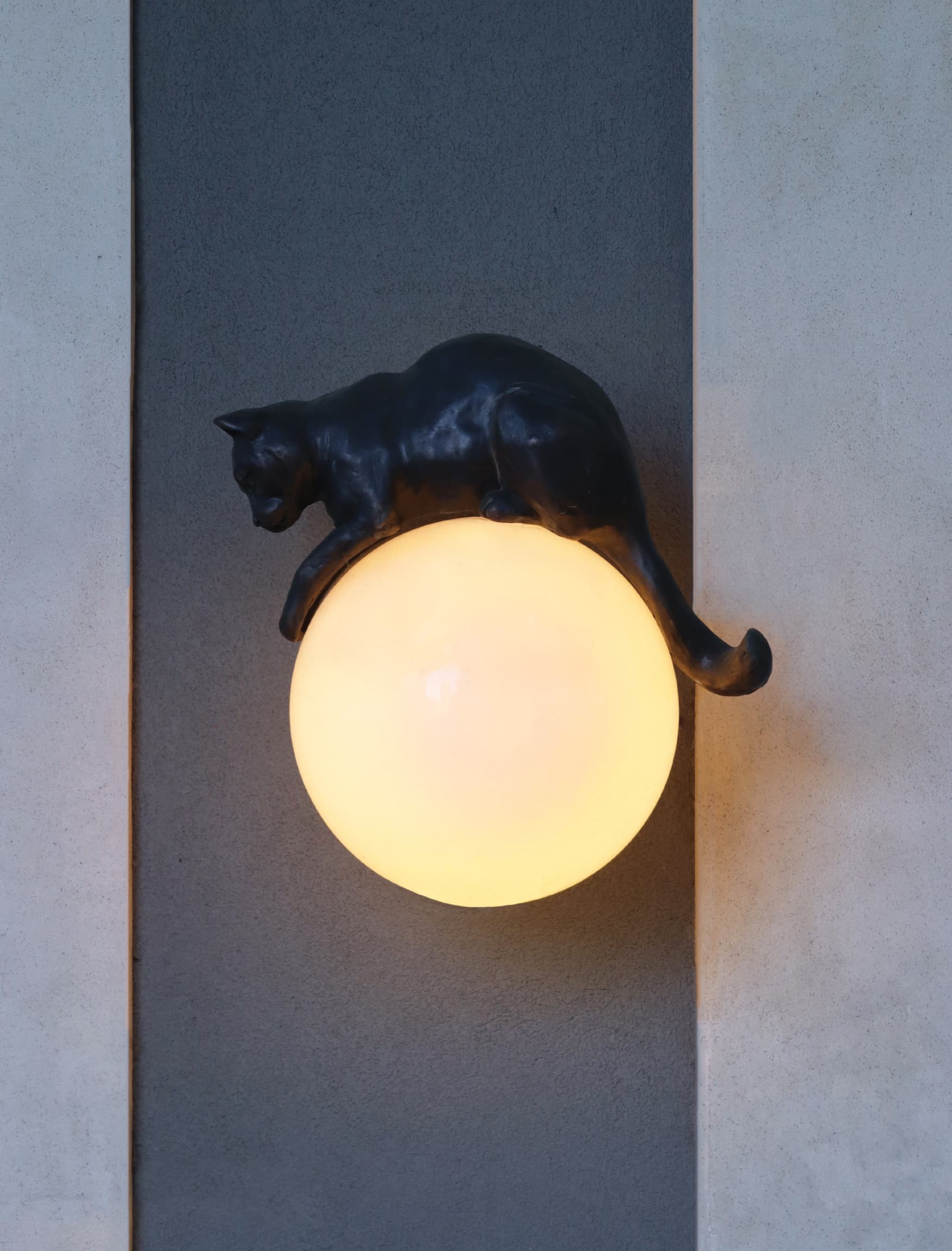 Close up detail of the custom light fixture designed by RSM Design for Babou's.