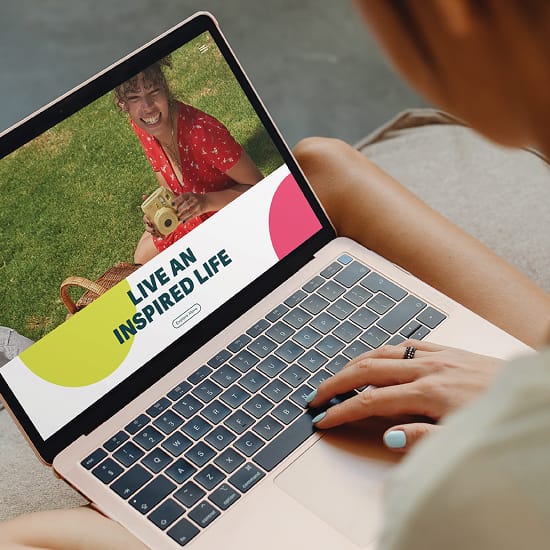 RSM Design Bravo Park — branded digital website design displayed on laptop, showing park lifestyle campaign with bold graphic identity and "Live an Inspired Life" messaging