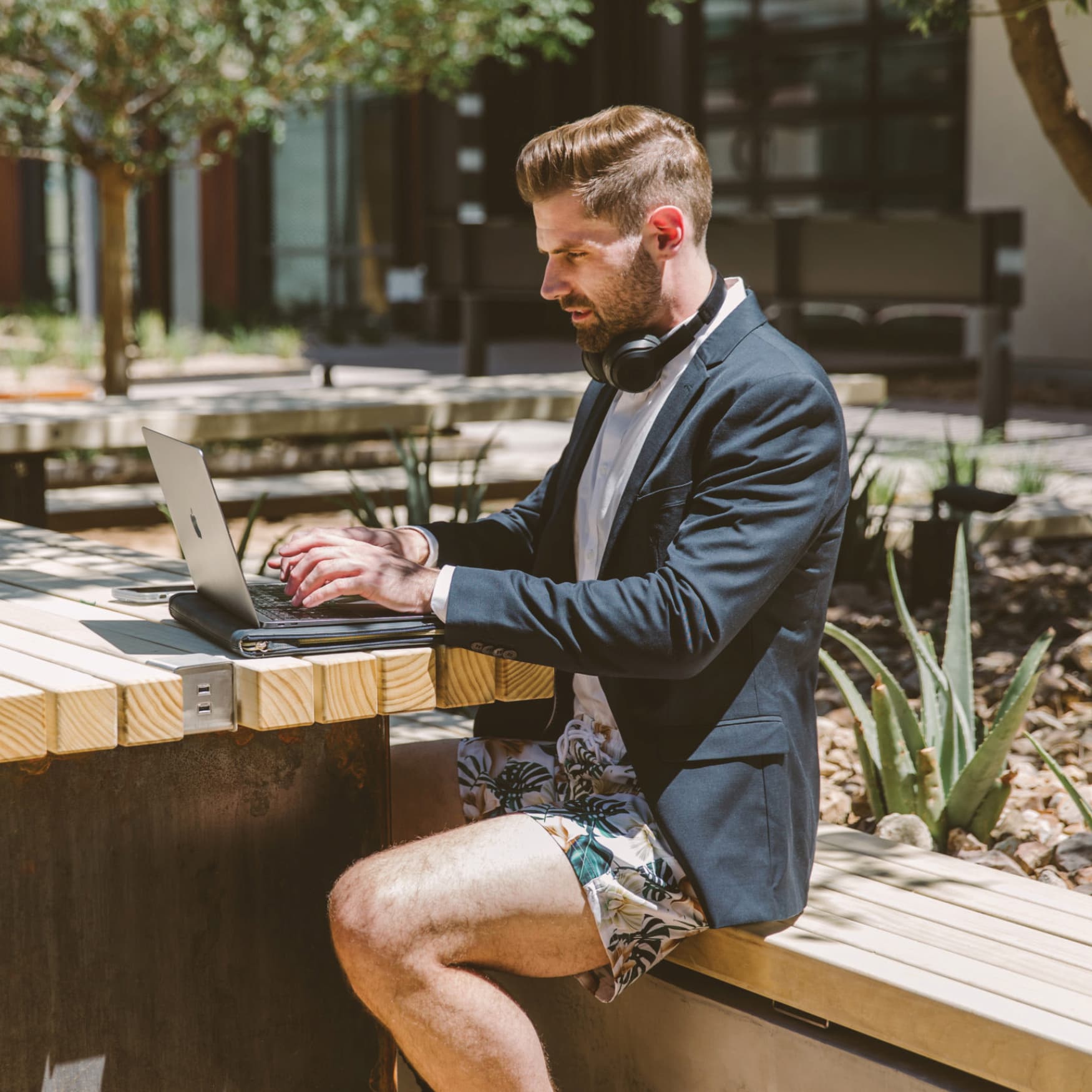 Image of a man working on a laptop at UnCommons. 