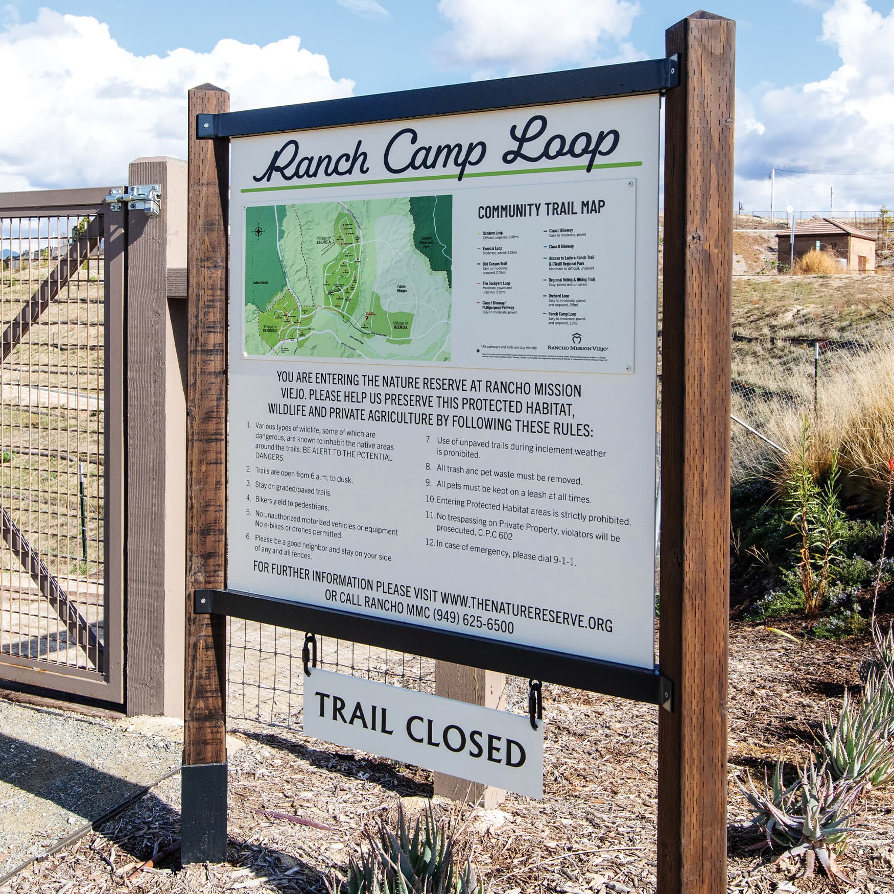 Ranch Camp Loop hiking trail signage done by RSM Design. Trail map, rules, and information on a white minimal sign.