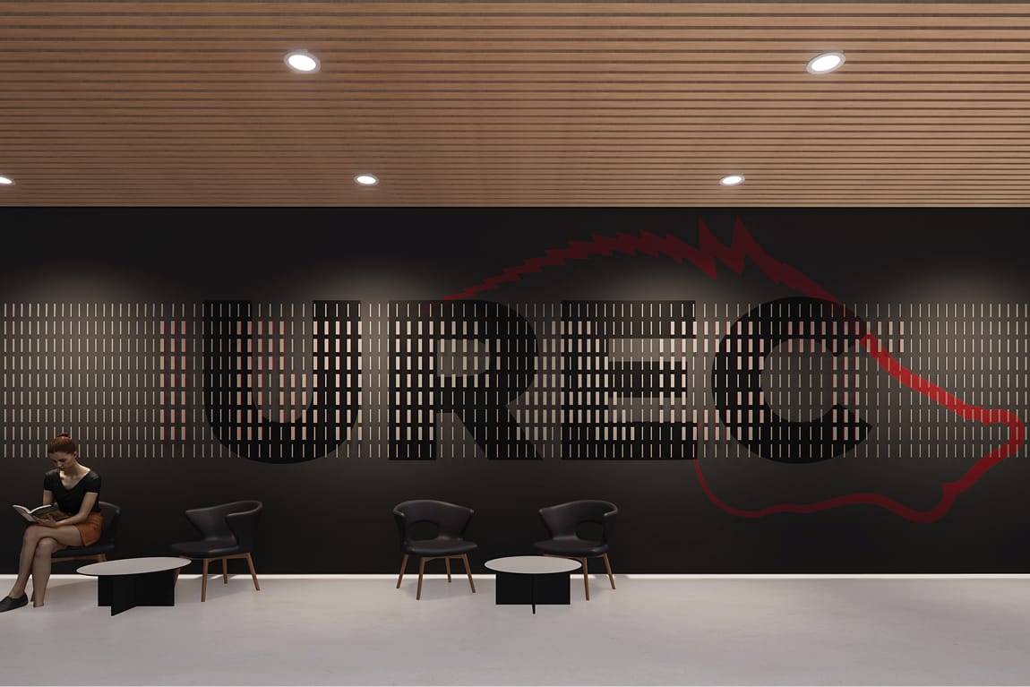 Architectural rendering of a lounge seating area in front of a dramatic dark feature wall. The wall displays large dimensional lettering formed by a grid of backlit rectangular panels, with a sweeping red graphic element resembling a heartbeat or athletic motion line overlaid across it. Three black lounge chairs and two small tables are arranged along the wall. A person sits reading on the left. The ceiling features warm wood slats with recessed lighting.
