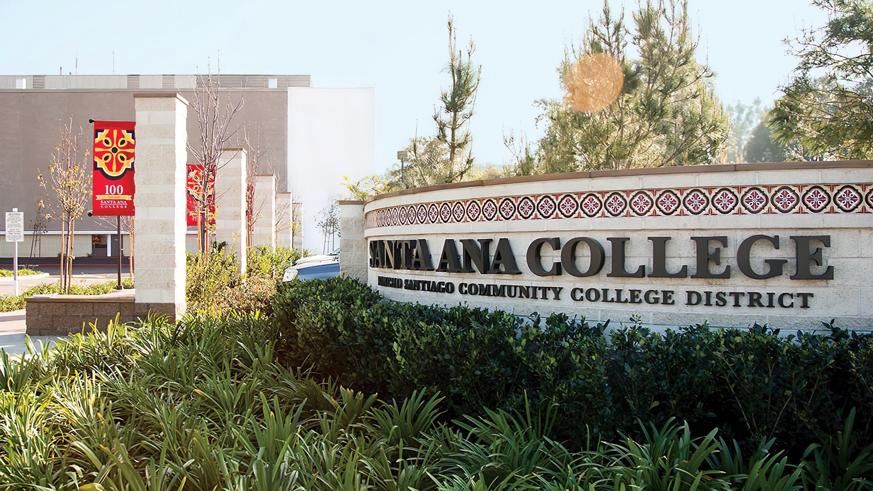 Wall with tiled accents featuring Santa Ana College dimensional letter identity