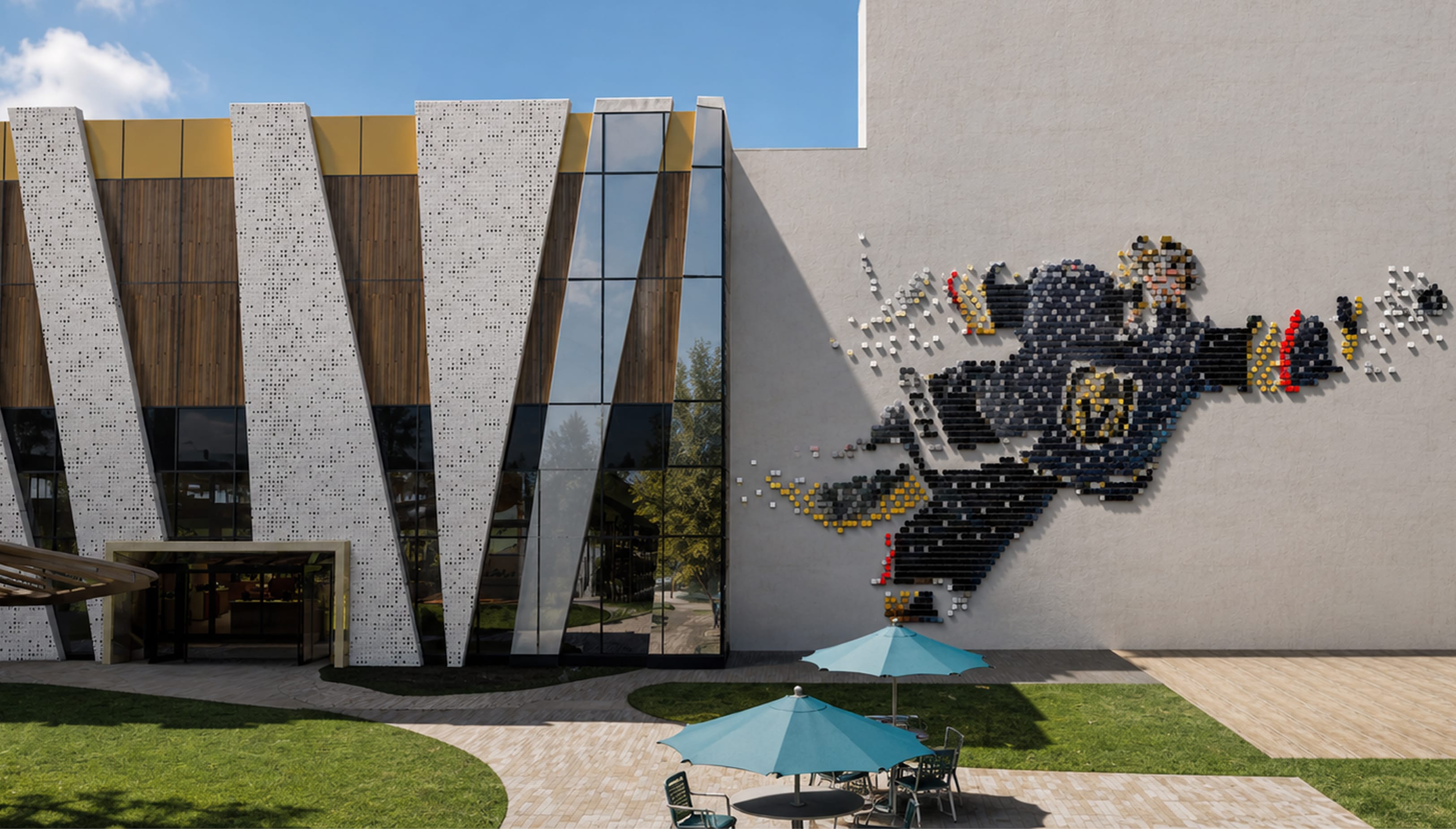 Rendering of a dimensional pixel-style wall mural of a hockey player in Golden Knights colors, built from projecting blocks in black, gold, and red across the ice arena’s exterior wall, beside a shaded patio, Hylo Park, Las Vegas, environmental graphic design by RSM Design.
