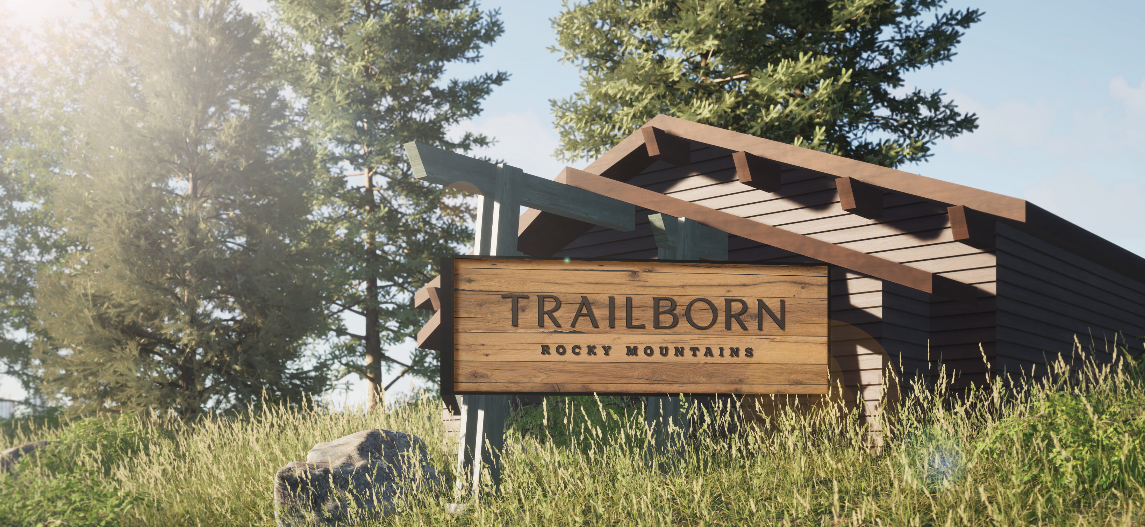 Architectural rendering of a low-profile "Trailborn Rocky Mountains" routed wood ground sign on a steel frame nestled in native grasses beside a dark wood cabin structure and pine trees in golden sunlight, showcasing signage and placemaking design for a hospitality environment by RSM Design.
