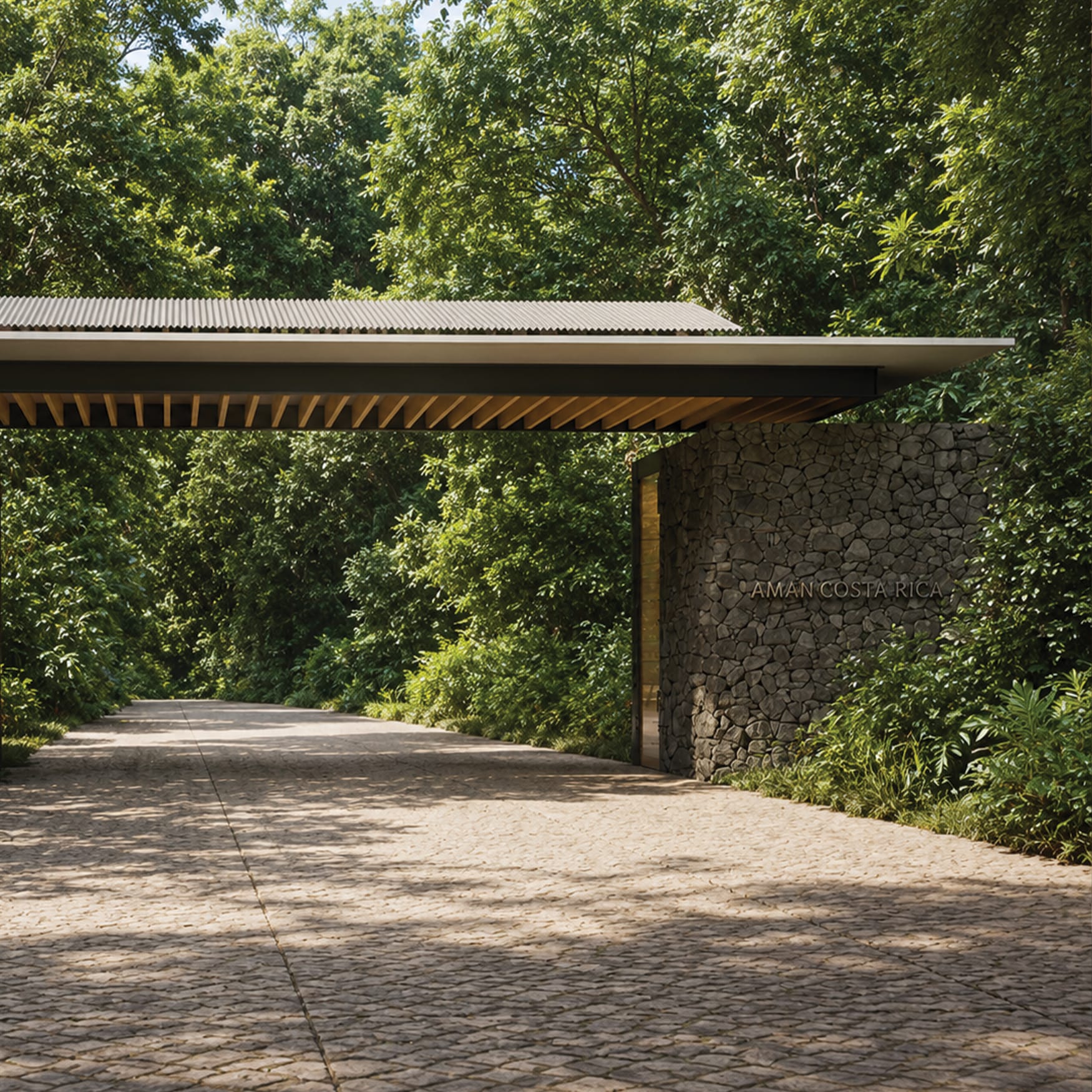 Luxury resort entrance in Costa Rica featuring a minimalist stone wall sign, natural wood canopy, textured paving, and lush tropical forest landscaping surrounding a secluded arrival driveway.