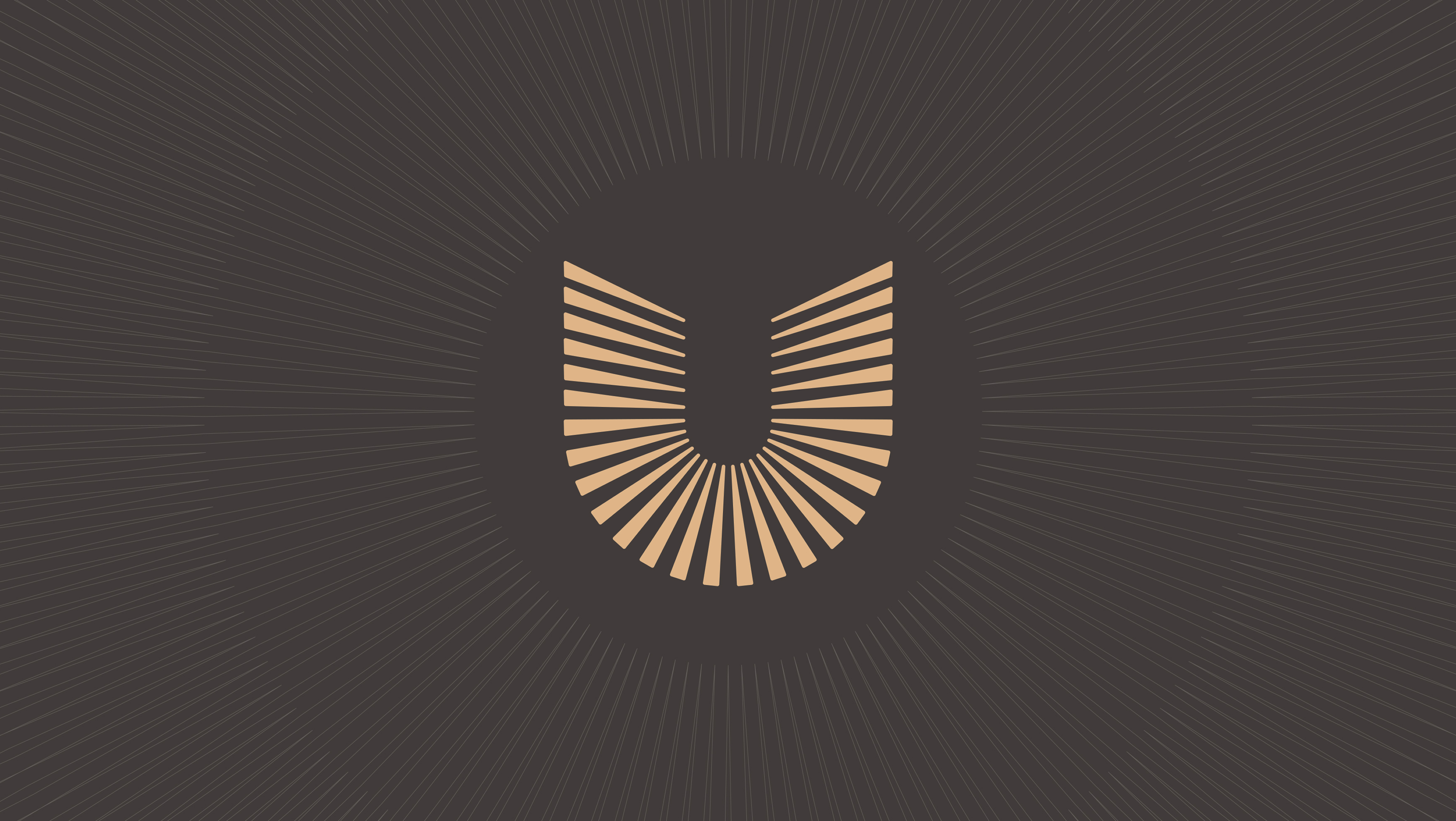 Uptown Tucson brand mark, a radiating gold U emblem on dark brown, brand identity by RSM Design