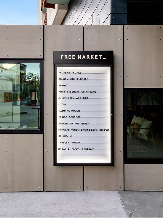 Free Market tenant directory signage at Runway Playa Vista in Los Angeles, designed as part of the retail district’s environmental graphics and wayfinding program by RSM Design.