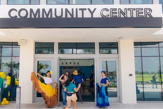 Doral Central Park Community Center entrance with building-mounted dimensional lettering — environmental graphic design by RSM DesignDoral Central Park Community Center entrance with building-mounted dimensional lettering — environmental graphic design by RSM Design