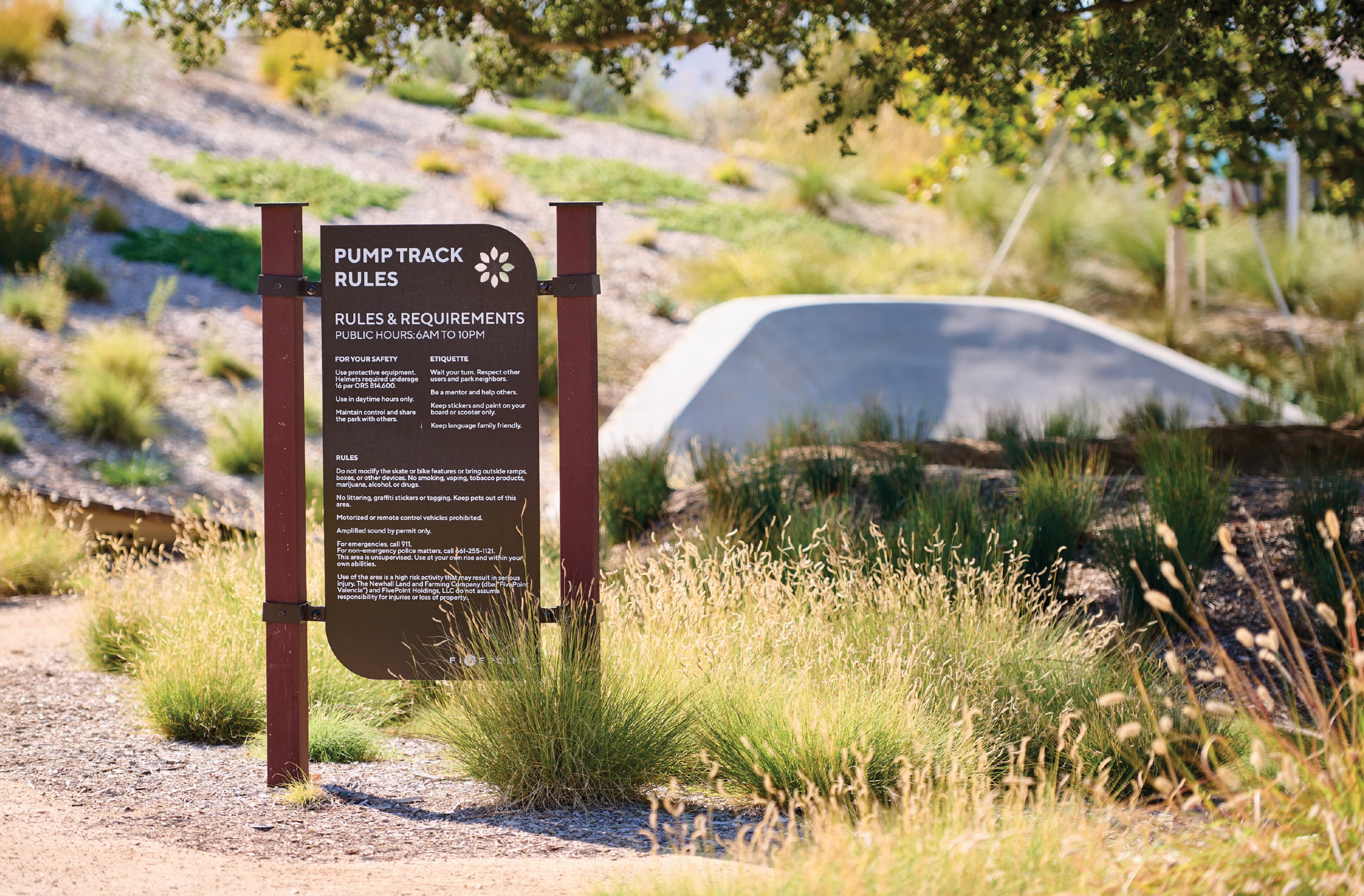 Image of the pump track rules signage for the pump track for bikes at Valencia in Sant Clarita, California. Signage by RSM Design. 
