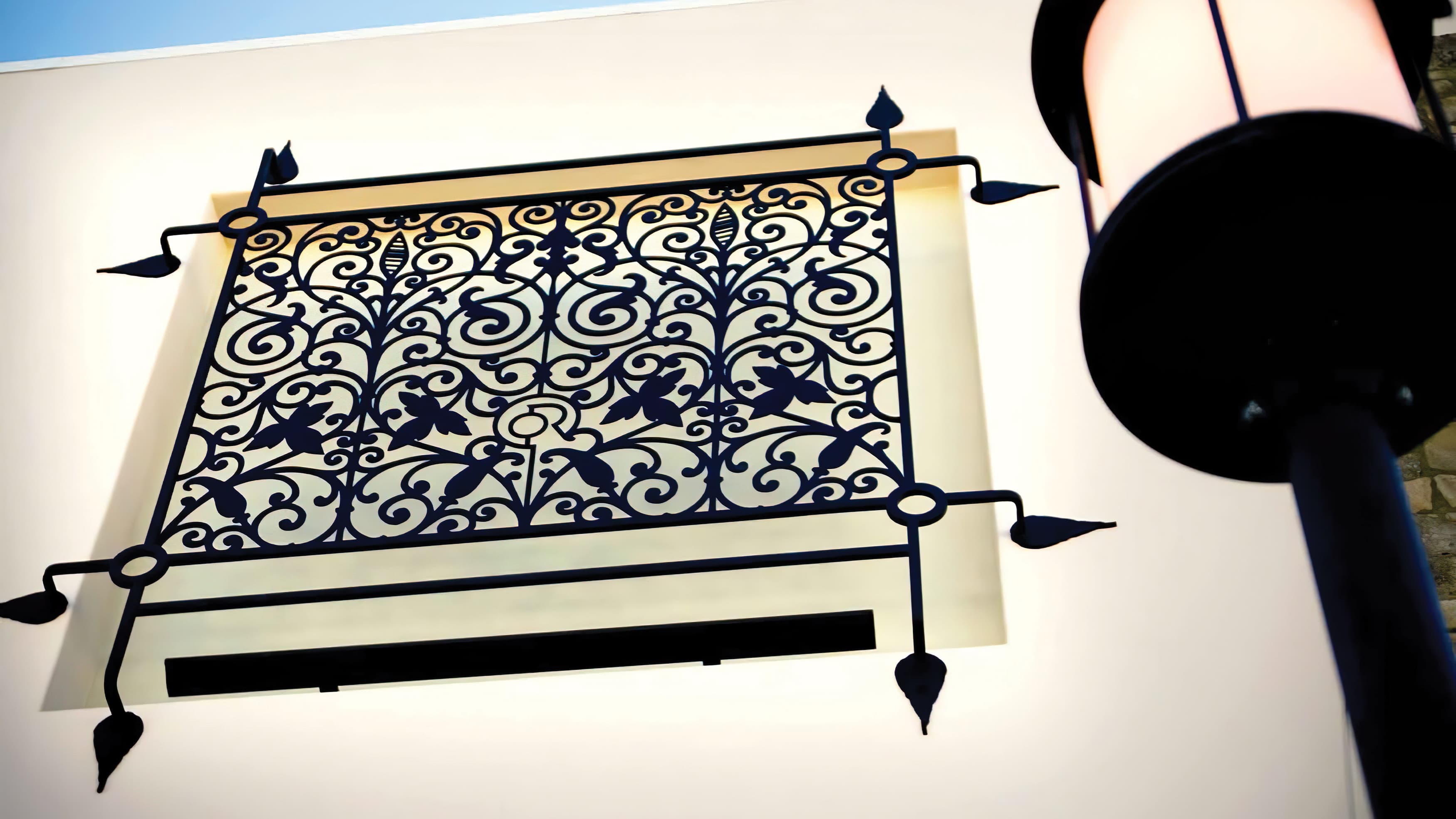 A patterned architectural grille feature, a piece of the public art program by RSM Design