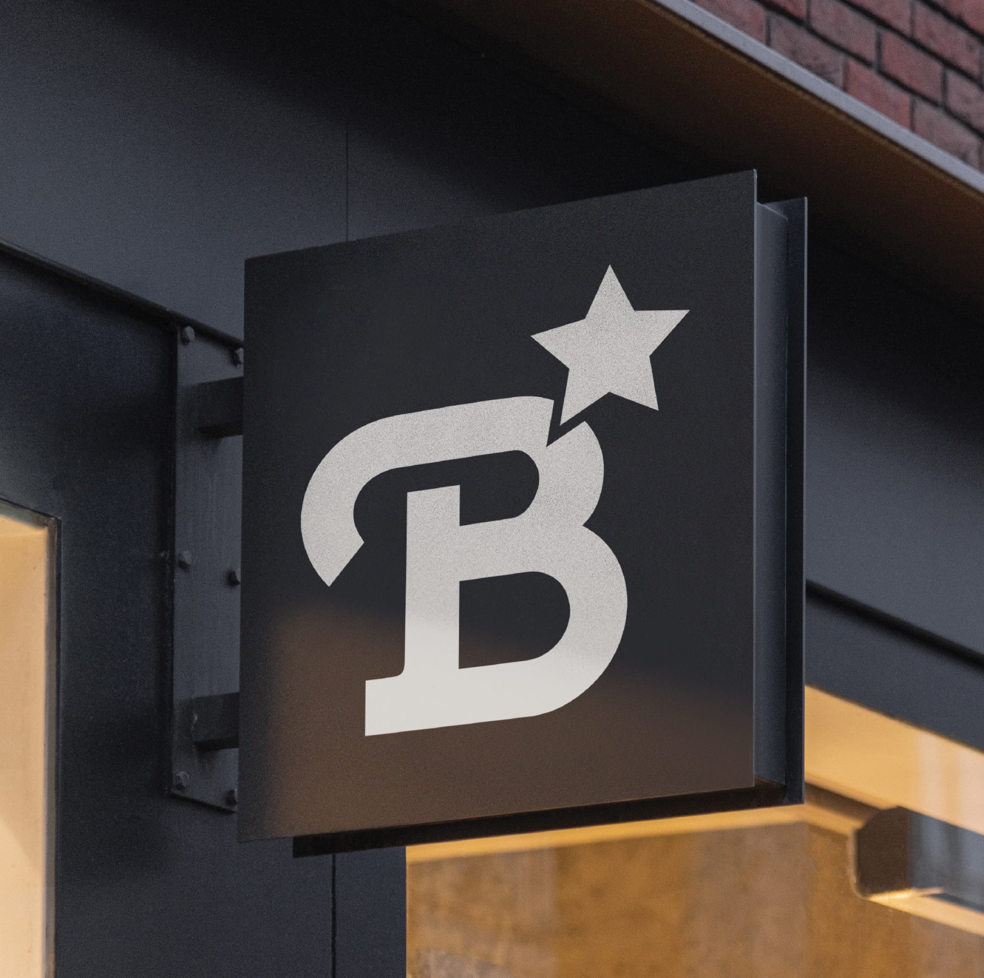 Exterior branded blade sign featuring The Bend HTX logo and star mark, illustrating environmental graphic design, signage design, and placemaking for a mixed-use retail, dining, and entertainment destination.