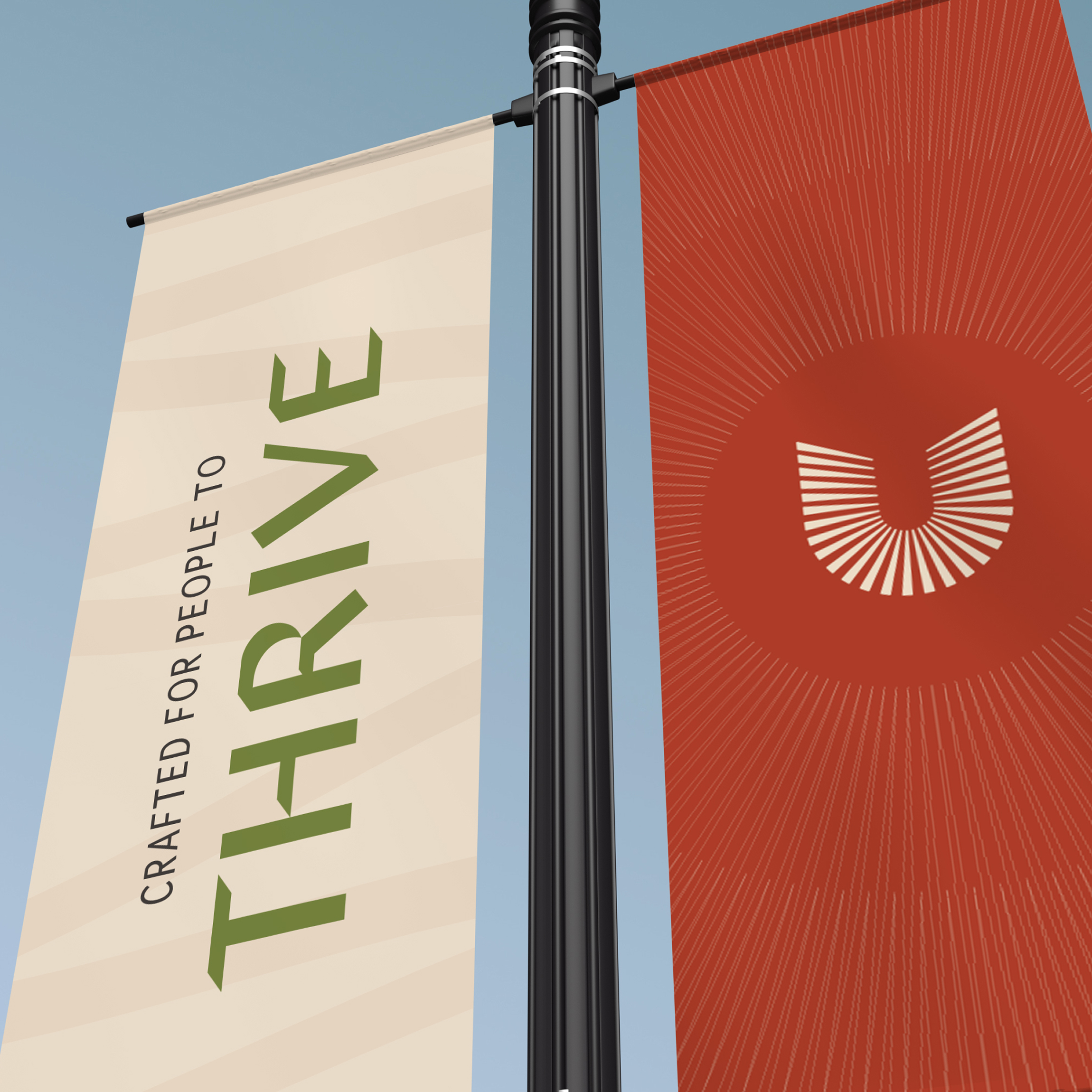 Uptown Tucson street pole banners reading Crafted for People to Thrive alongside the U emblem, environmental branding by RSM Design