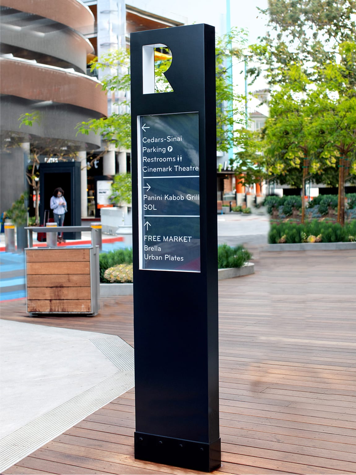 Pedestrian wayfinding directory at Runway Playa Vista retail district guiding visitors to shops, restaurants, and entertainment, designed as part of the environmental graphics program by RSM Design.