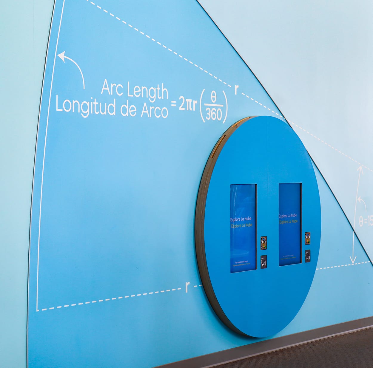 Claude responded: La Nube children's museum bilingual mathematics wall graphic with interactive kiosk — environmental graphic design by RSM DesignLa Nube children's museum bilingual mathematics wall graphic with interactive kiosk — environmental graphic design by RSM Design