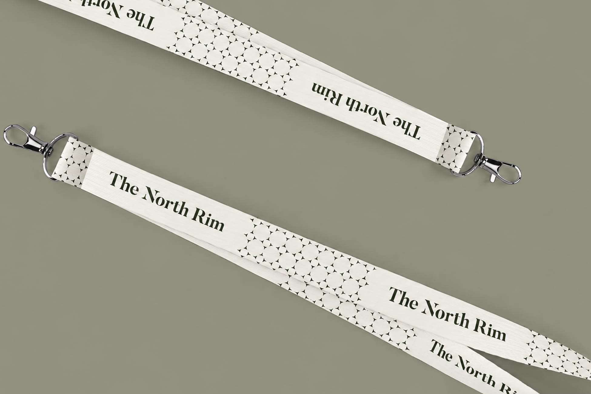 The North Rim branded lanyards with geometric star pattern, brand identity design by RSM Design