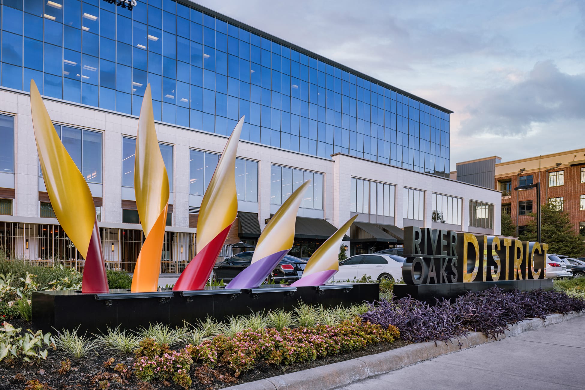 River Oaks District Houston monument sign with sculptural leaf art installation, environmental graphic design by RSM Design