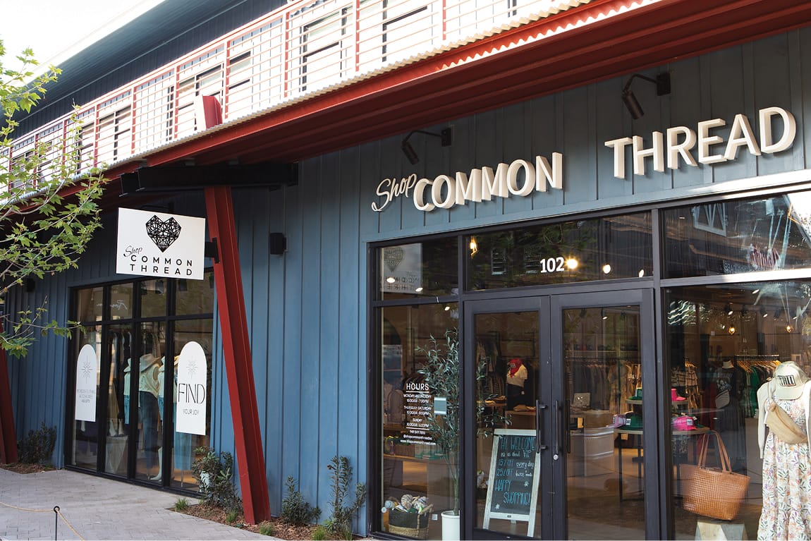 River Street Marketplace Common Thread storefront dimensional signage, environmental graphic design by RSM Design