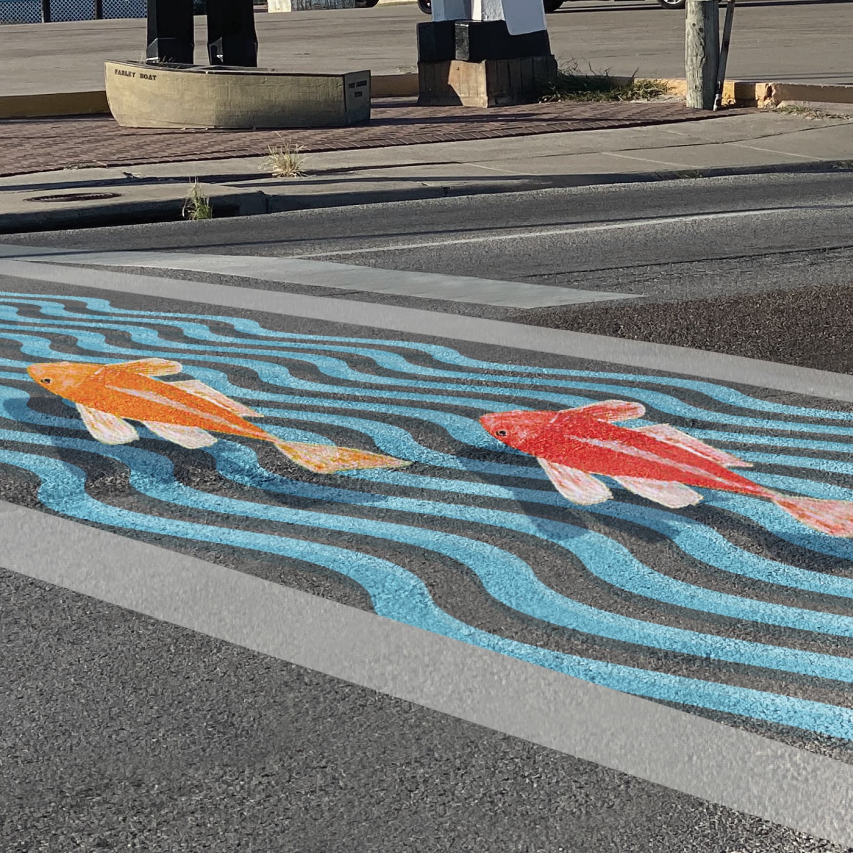 Painted fish and wave graphics for the crosswalk for the City of Port Aransas, designed by RSM Design. 