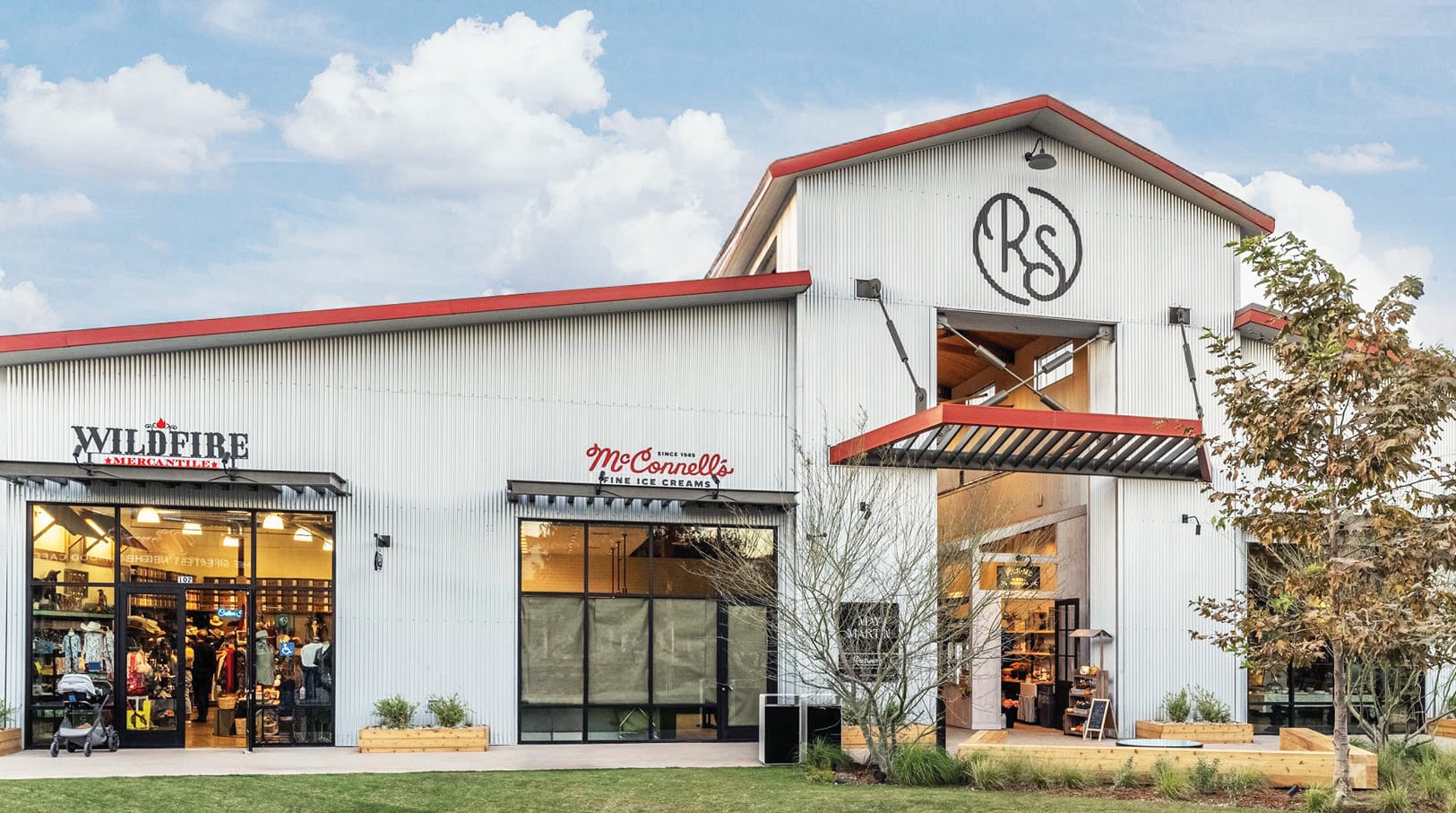 River Street Marketplace exterior with retail storefront signage, environmental graphic design by RSM Design