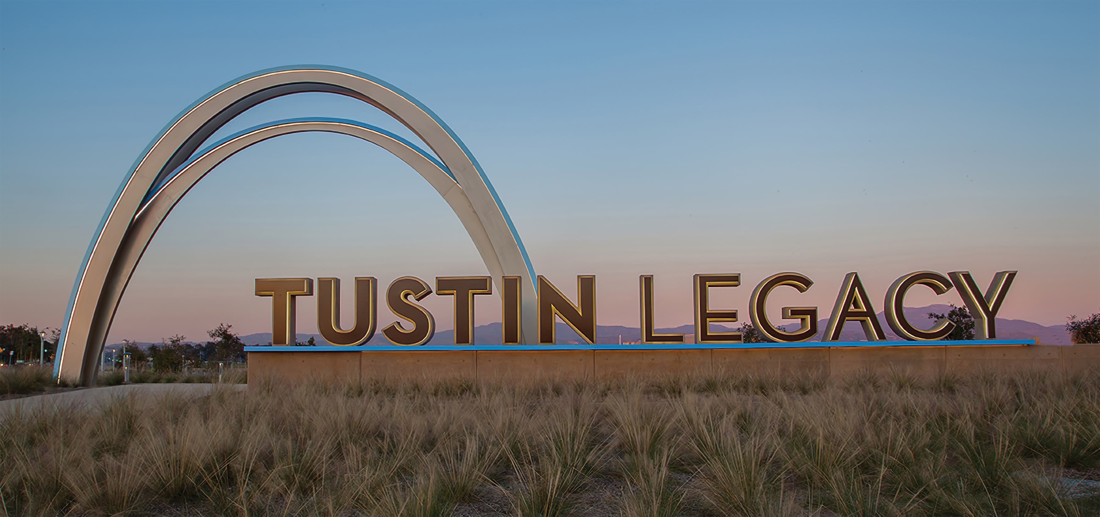 The Tustin Legacy archway serves as a landmark for the city of Tustin, illustrating the landmark element discussed in our explanation of what wayfinding is