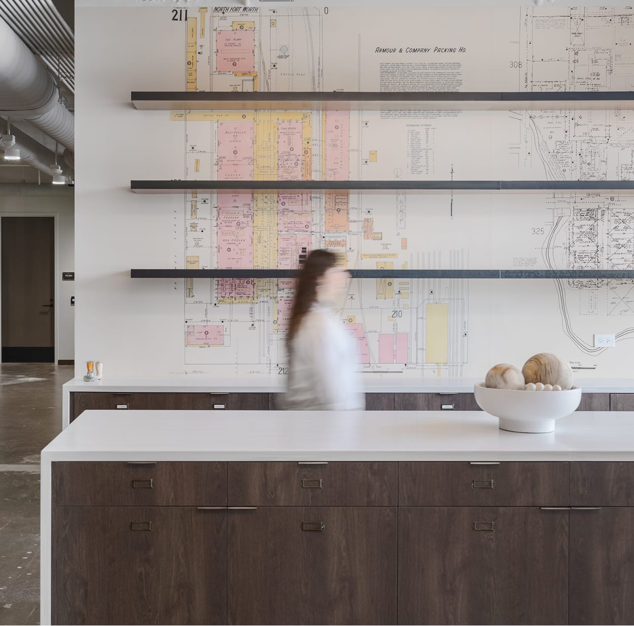 The Armour Stockyards break room with historic packing house map mural, environmental graphic design by RSM Design