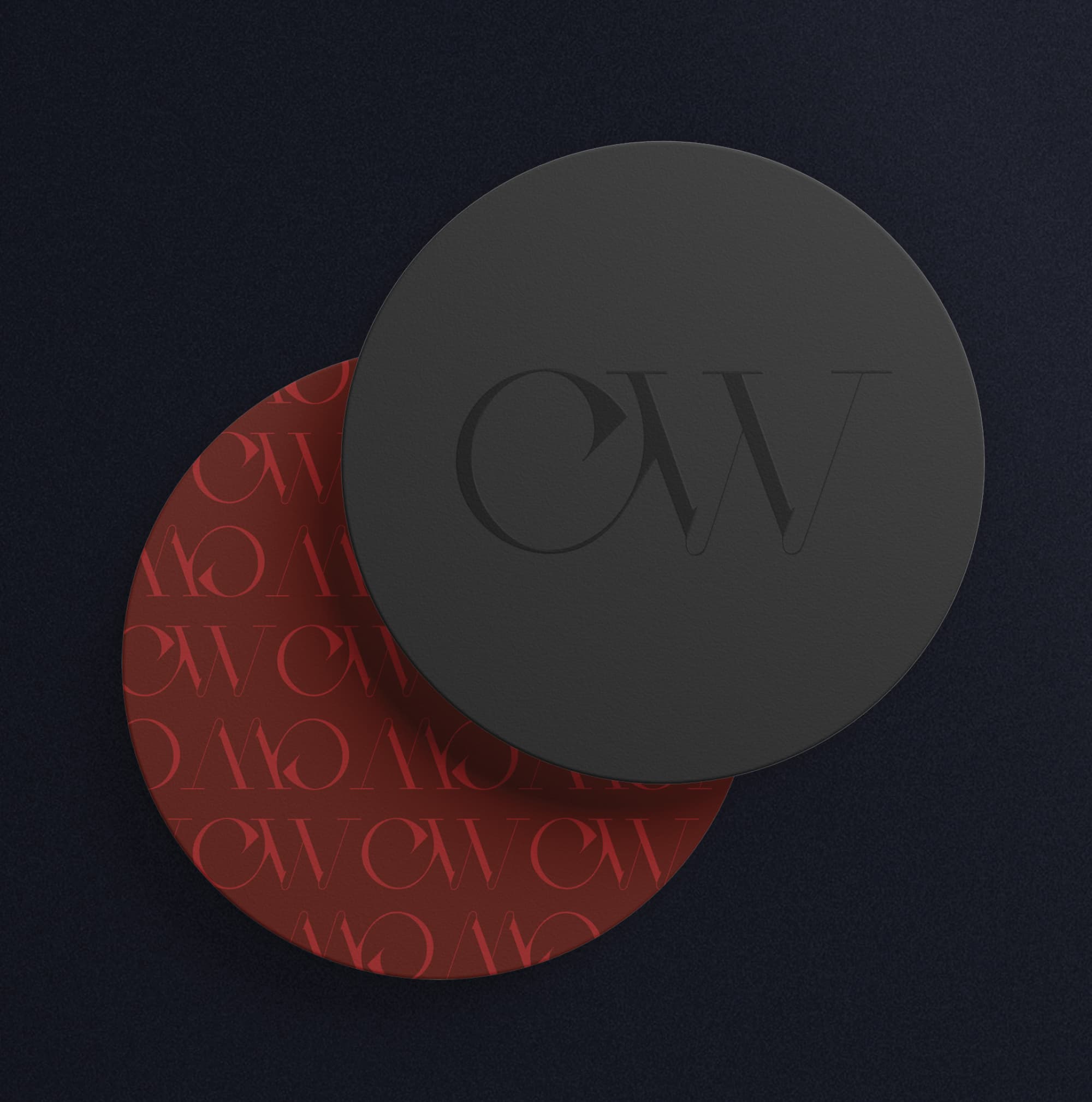 CW Prime branded coaster set featuring debossed charcoal monogram logo and crimson red repeating pattern coaster — RSM Design branding and visual identity, print and digital collateral, and specialty graphics for hospitality and food and beverage destinations.