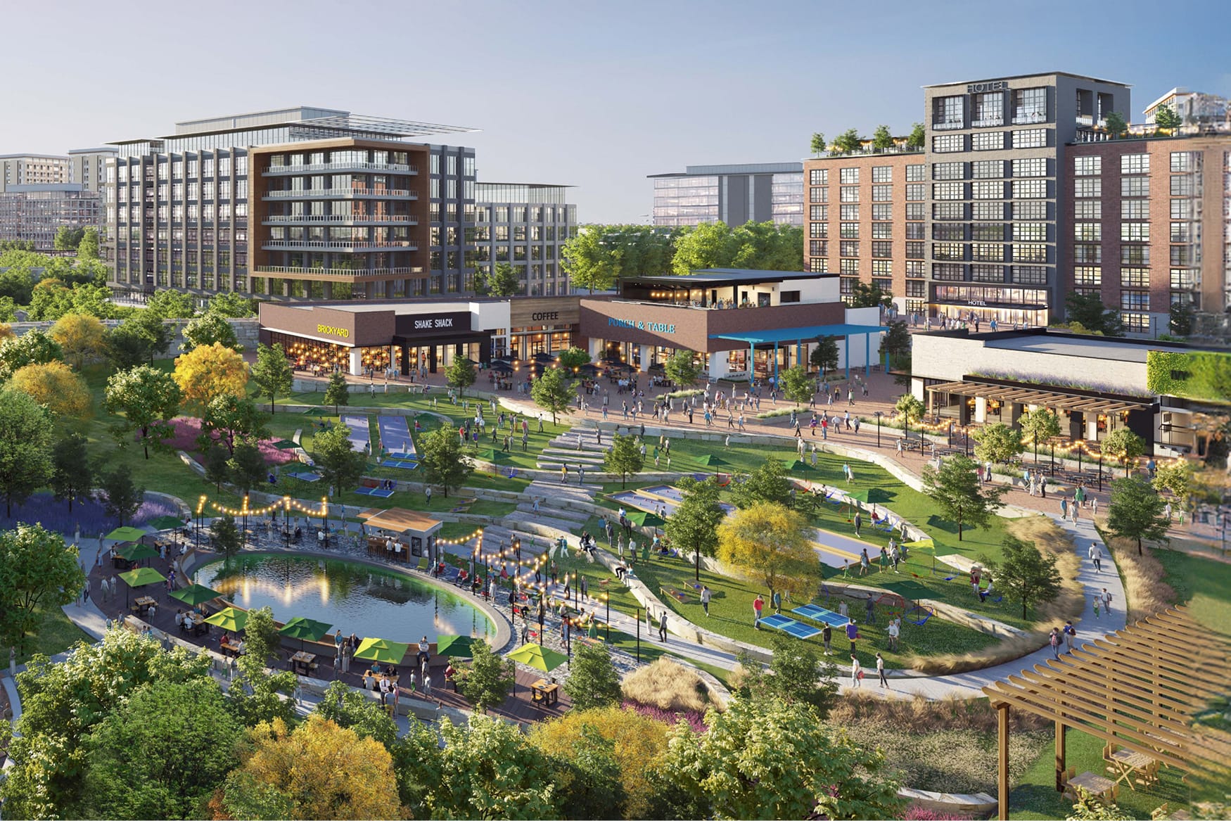 Aerial rendering of Sloan Corners mixed-use development with retail storefronts, green lawn, and pond - environmental graphic design by RSM Design