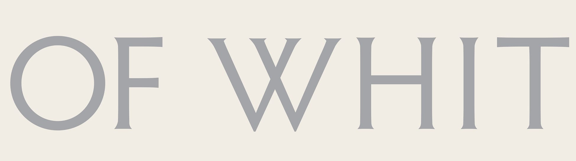 City of Whittier branding detail featuring oversized serif typography in a neutral color palette, highlighting the refined visual identity system.
