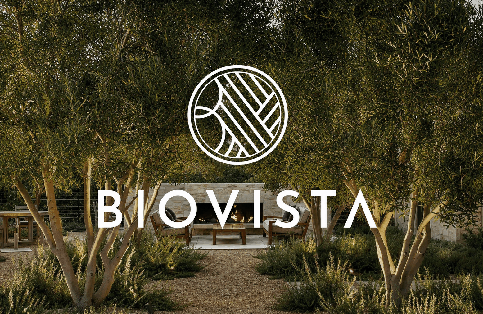 White 'Biovista' logo and wordmark overlaid on a photo of an outdoor lounge with a stone fireplace and wood furniture, framed by rows of sculptural trees.