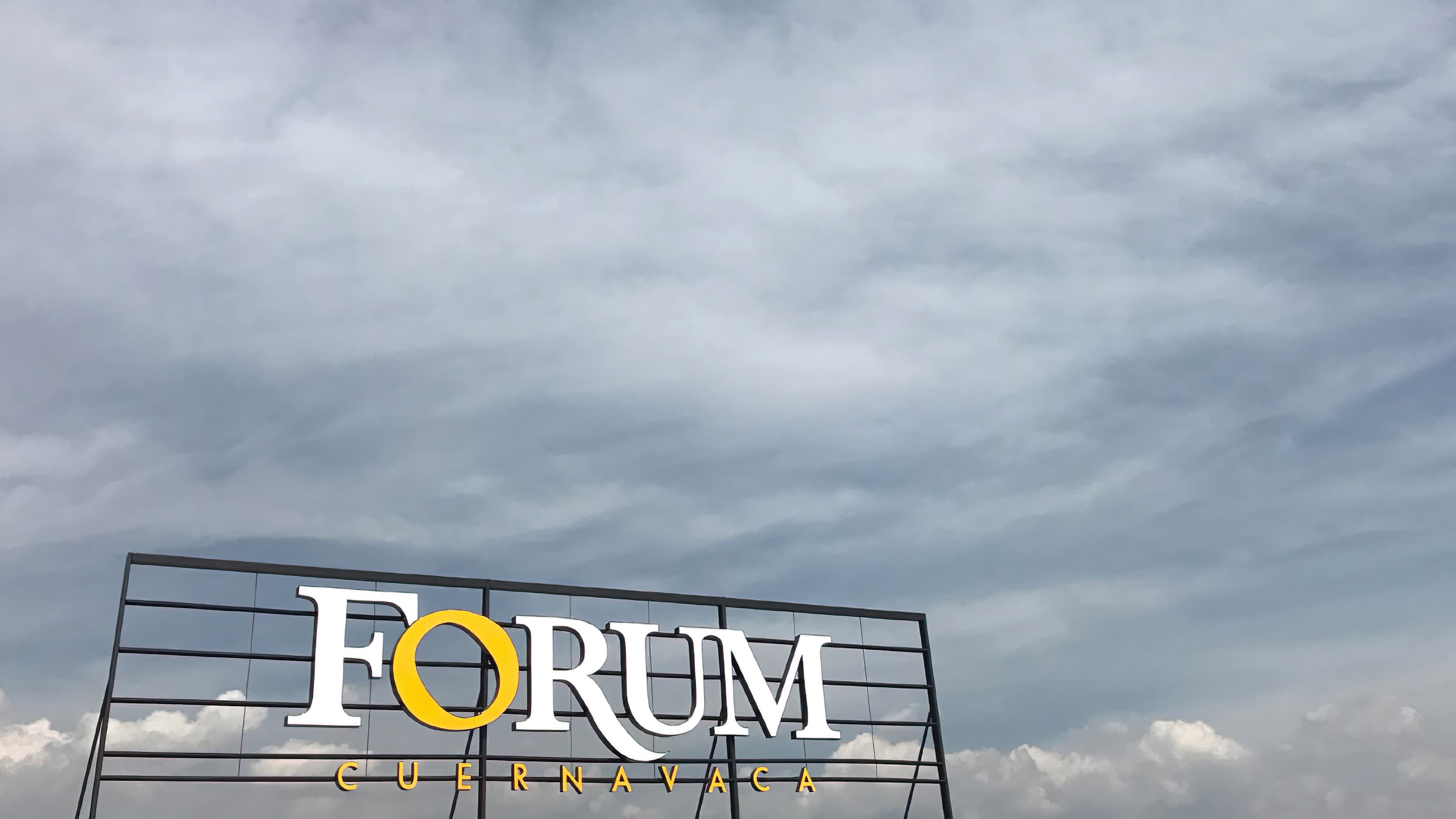 A photograph of a rooftop identity sign designed for Forum Curenavaca