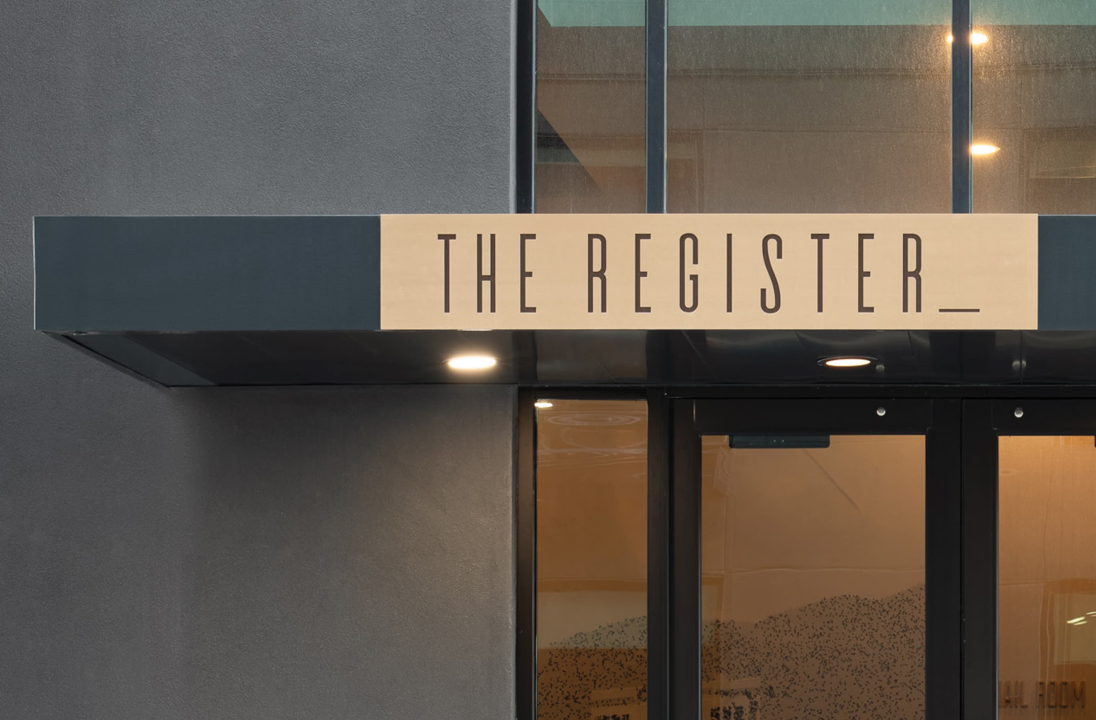 Entrance signage of the Register at Post District in Salt Lake City, Utah. 