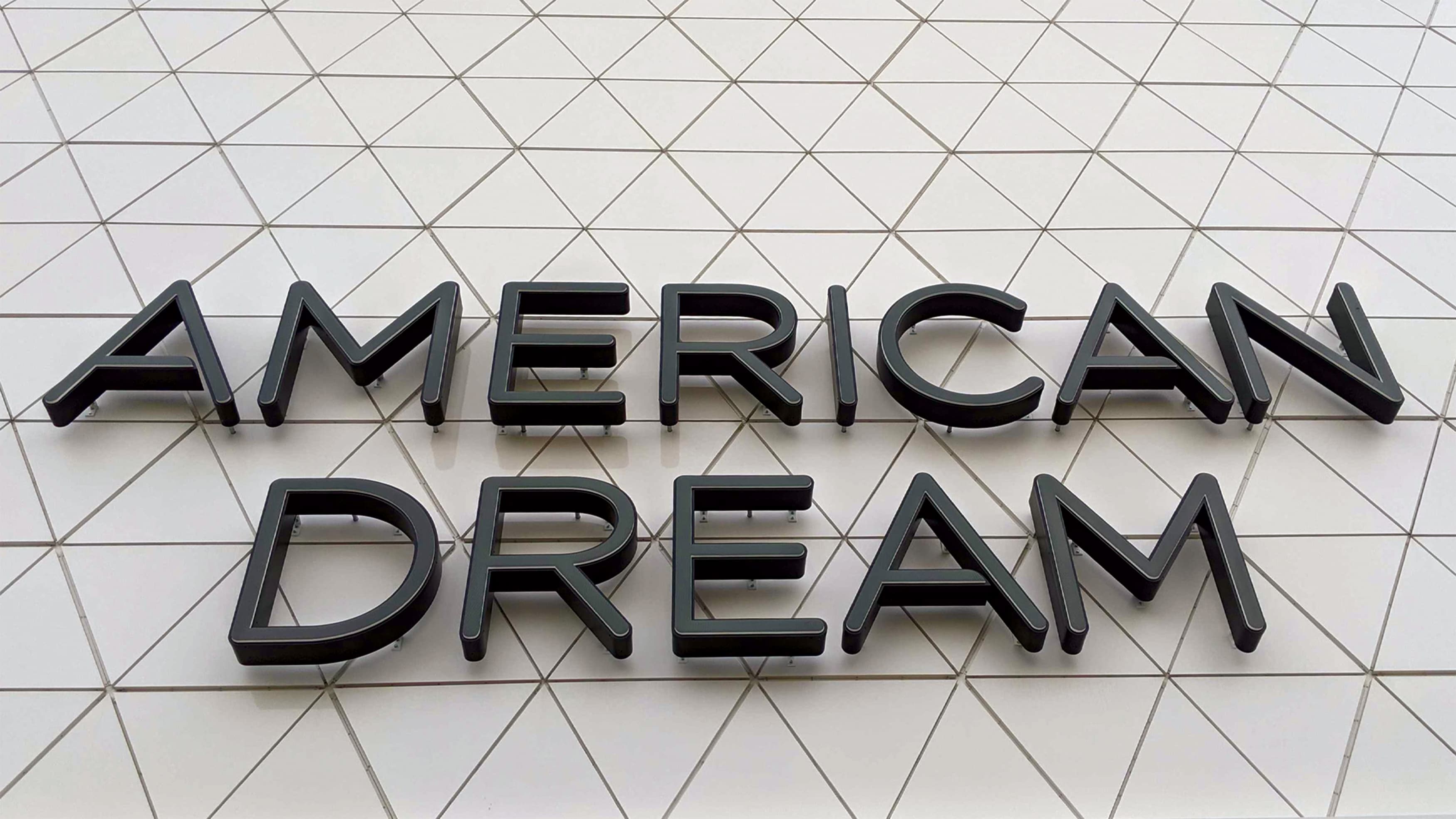 American Dream dimensional identity signage on building facade.