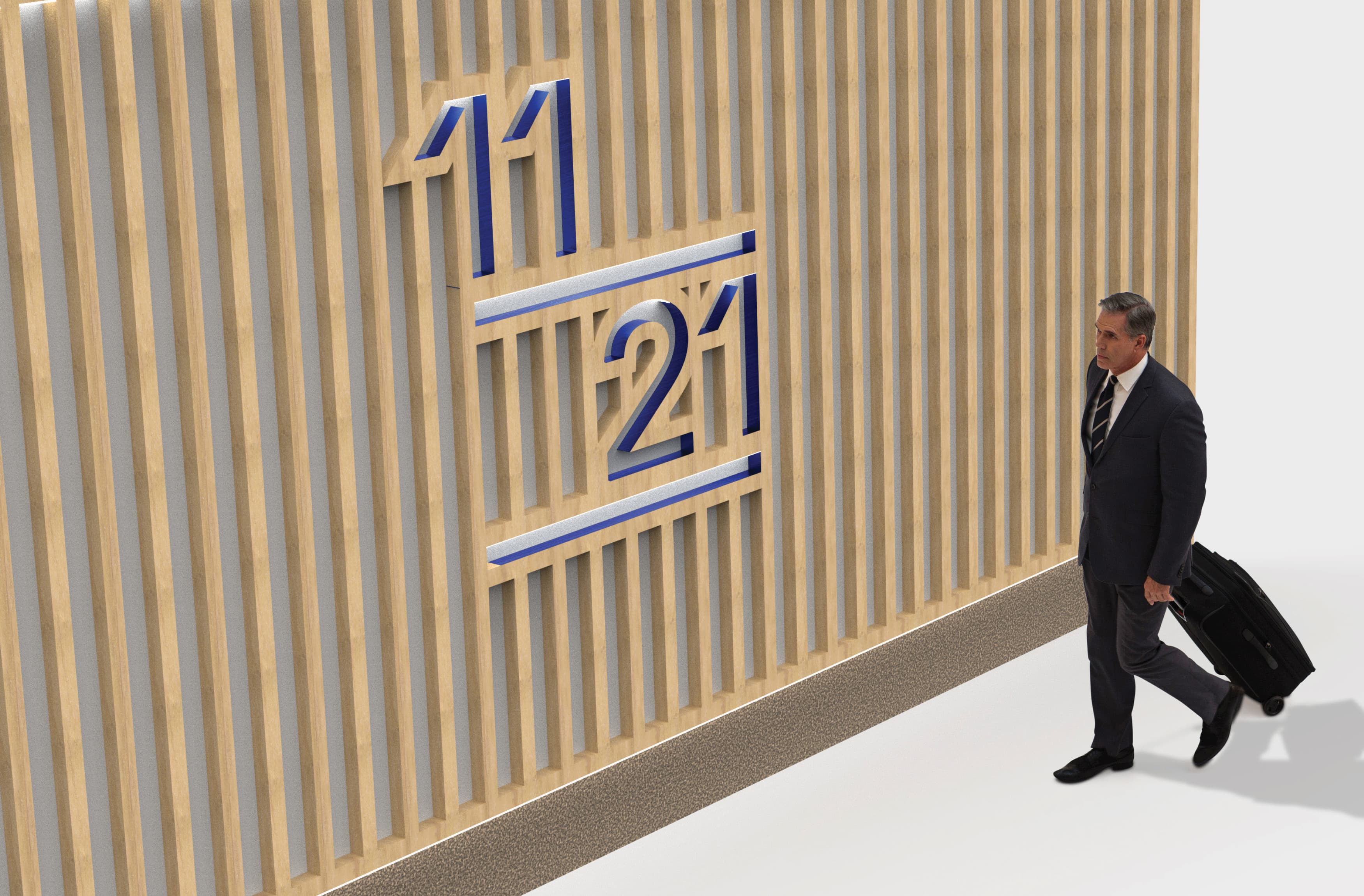 Man walking past the large 1121 Symphony Square identity signage by RSM Design. 