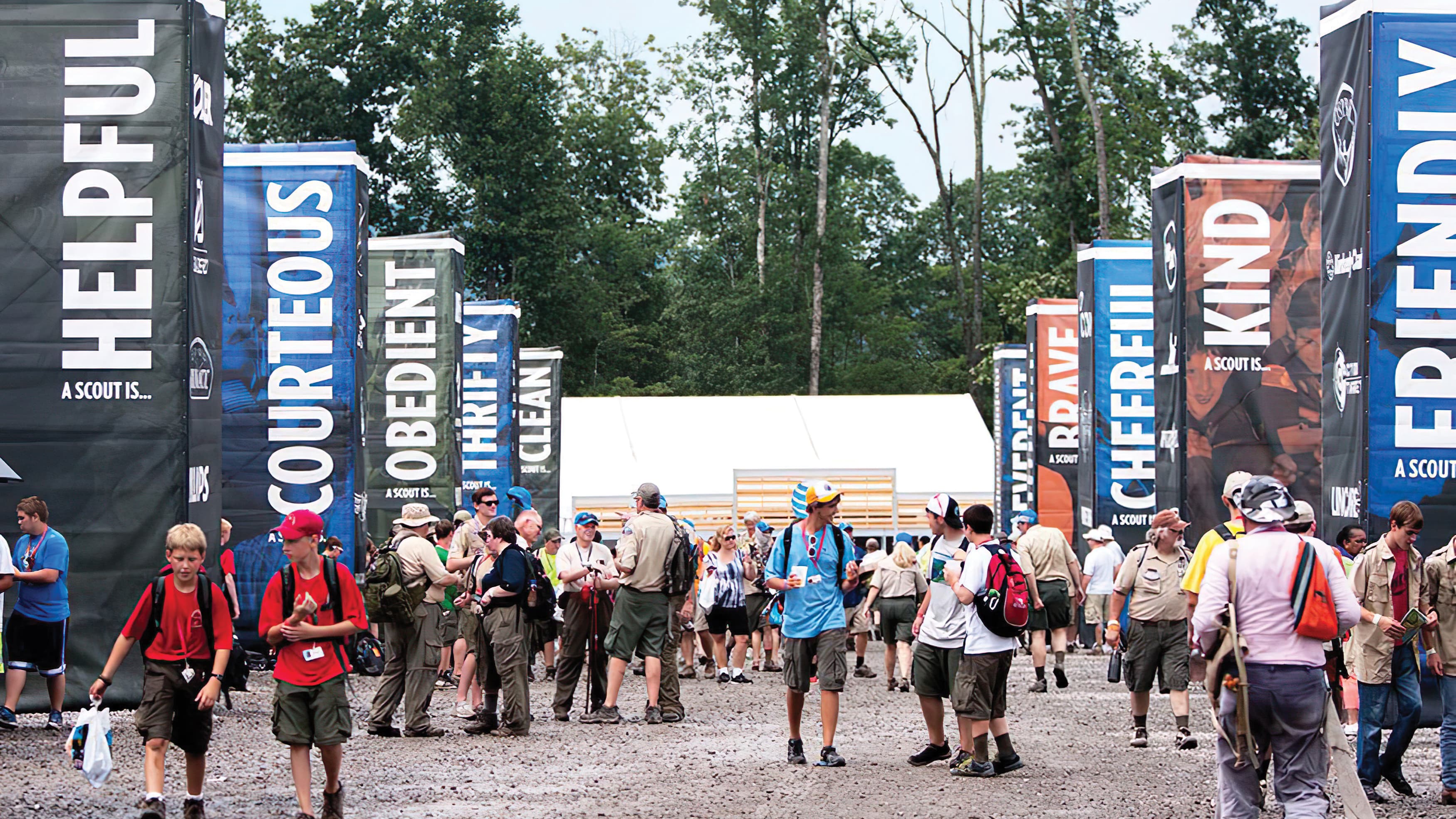 Dozens of Boy Scouts with RSM Designed totems in the background.