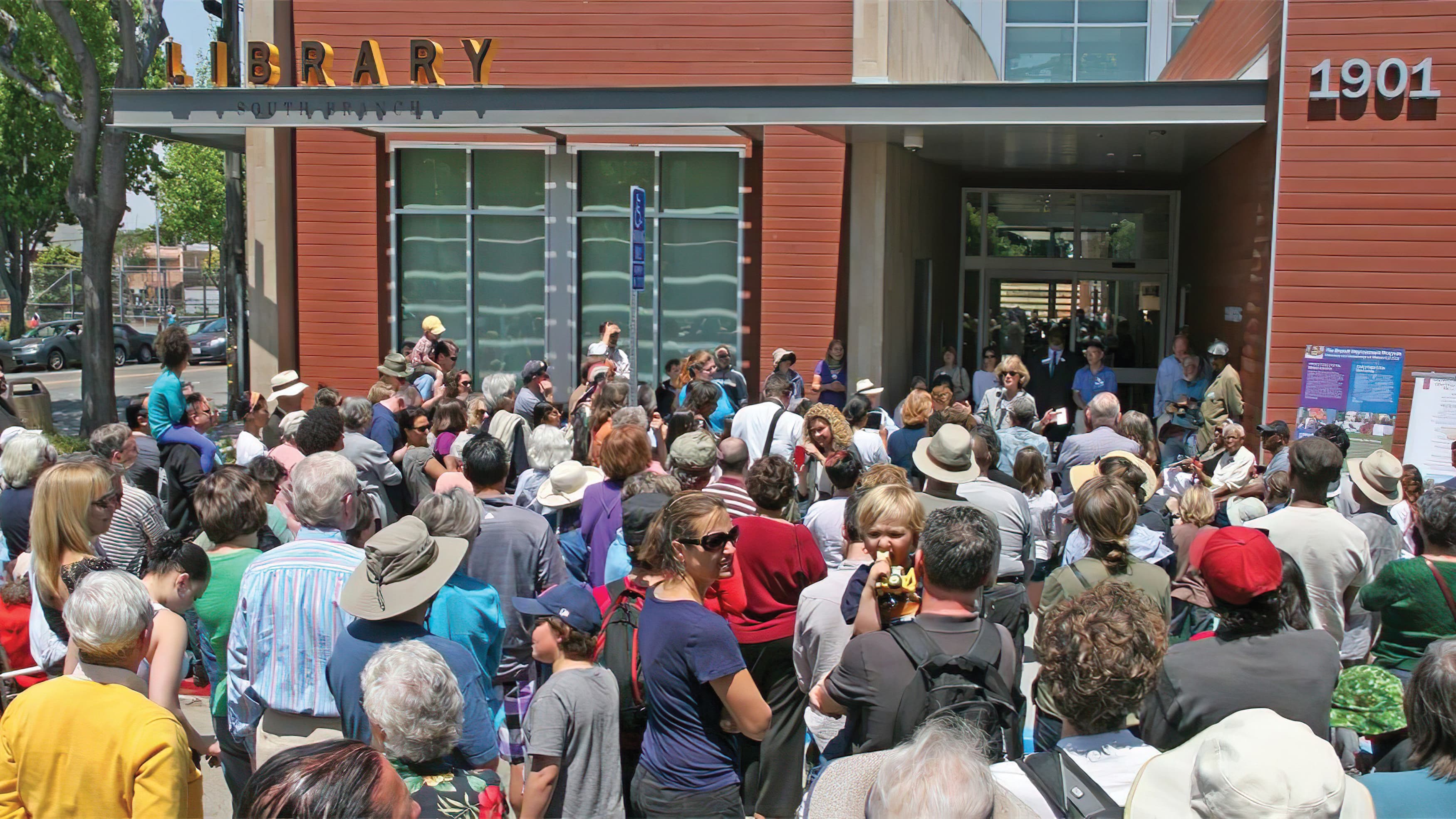 People gather in front of South Berkeley Library branch grand opening