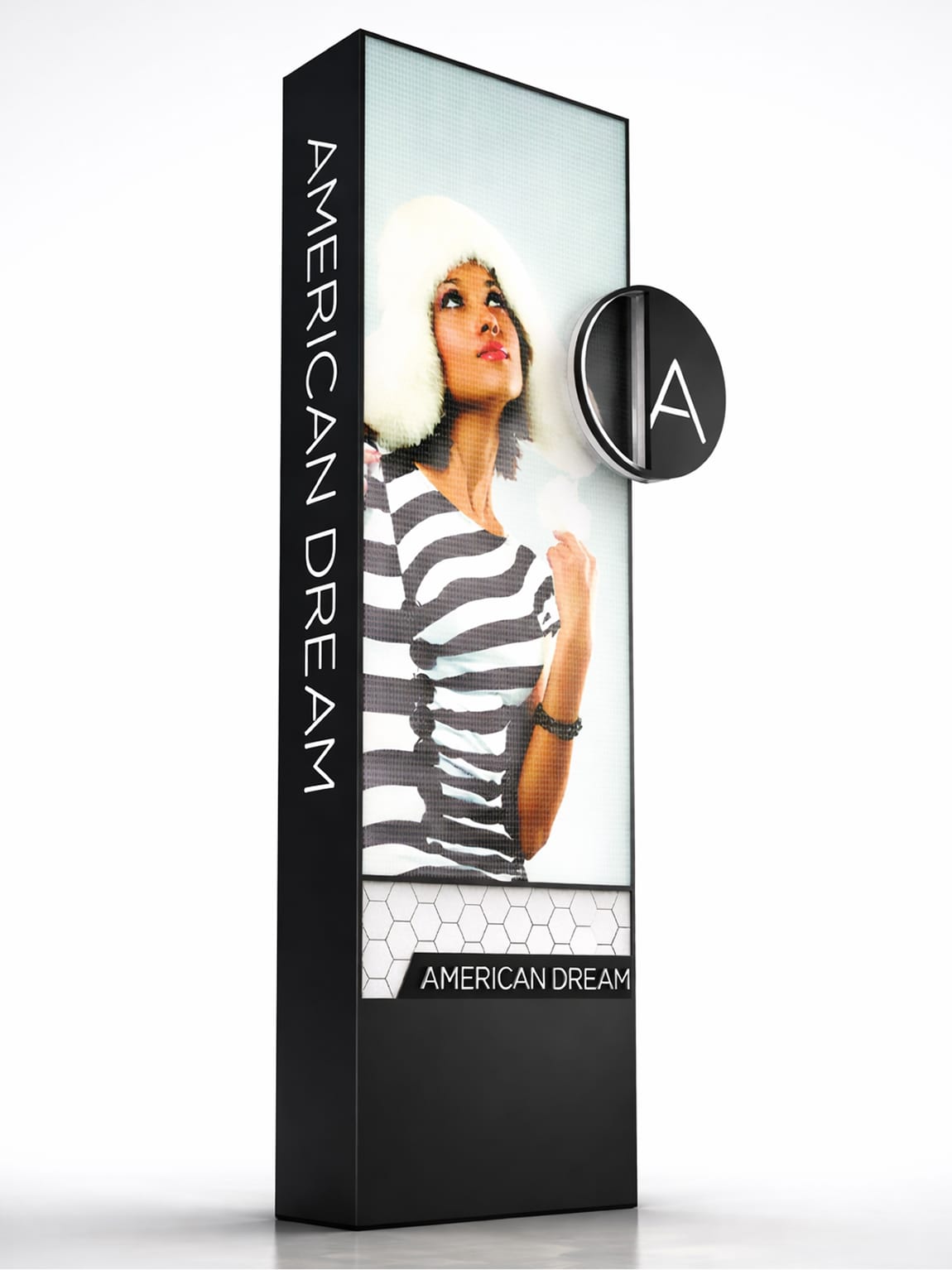 Rendered design concept of a freestanding digital LED pylon sign tower for American Dream mall in East Rutherford, New Jersey, featuring a large-scale fashion campaign display screen, a projecting circular American Dream logo medallion, and vertical wordmark on a matte black cabinet — showcasing RSM Design's digital integration and interactive solutions, master sign program, and branded environments for a large-scale mixed-use retail and entertainment destination.