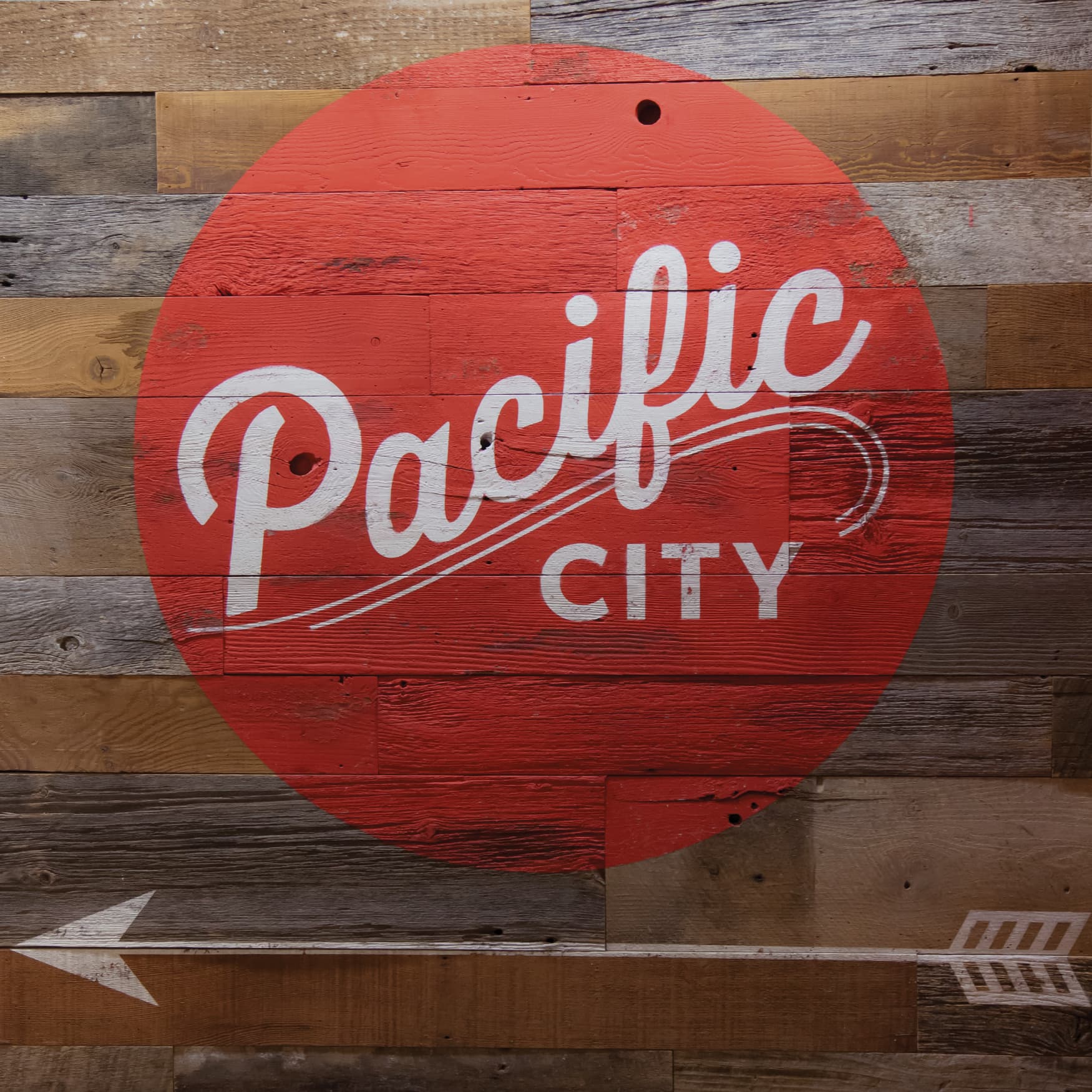 Pacific City waterfront retail project painted identity graphic