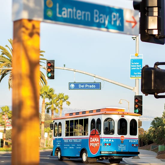 Dana Point street signage and PCH Trolley at Del Prado intersection, wayfinding by RSM Design
