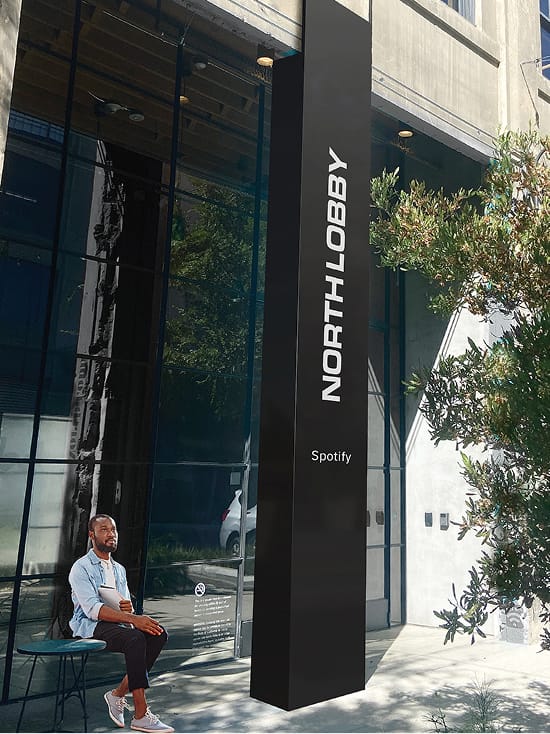 North Lobby entrance sign identifying Spotify at ROW DTLA - wayfinding and environmental graphic design by RSM Design