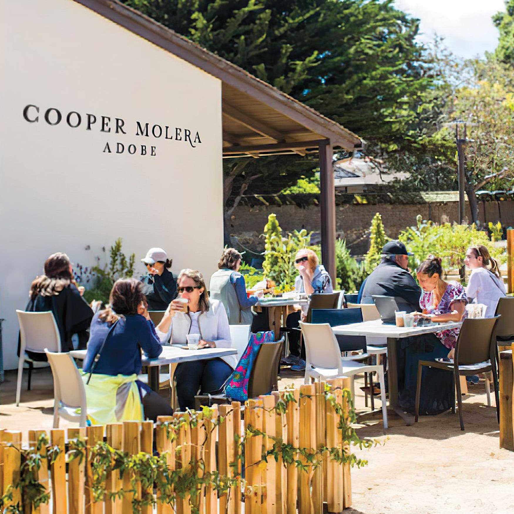 RSM Design painted storefront identity and brand for Cooper Molera Adobe, in Monterey, California,  is a historic property jointly managed with the National Trust for Historic Preservation