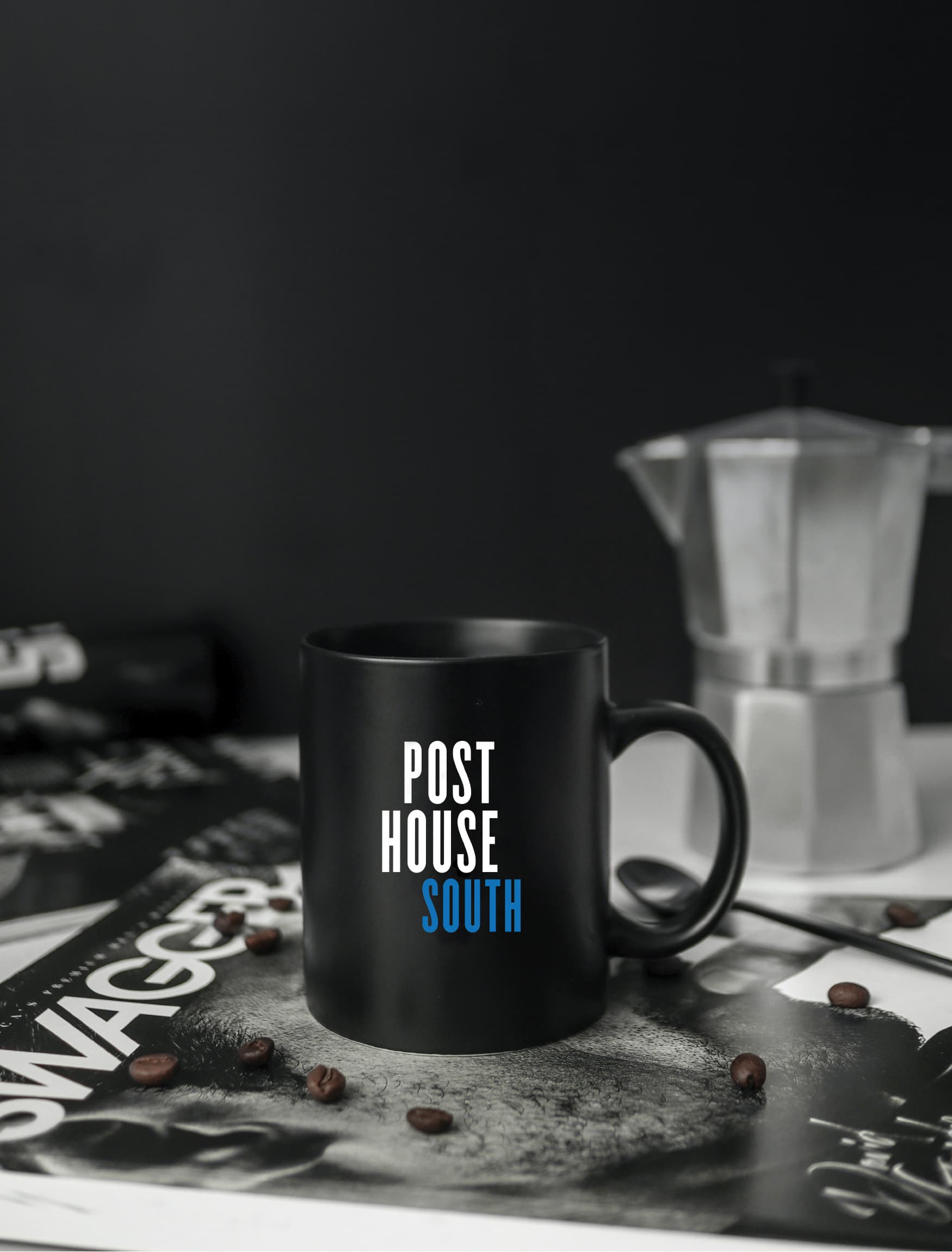 Post House South black mug with blue lettering. 