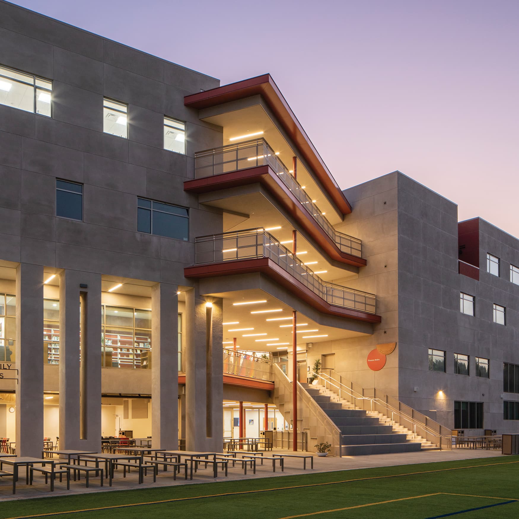 Nighttime shot of Brentwood School. Wayfinding signage by RSM Design.