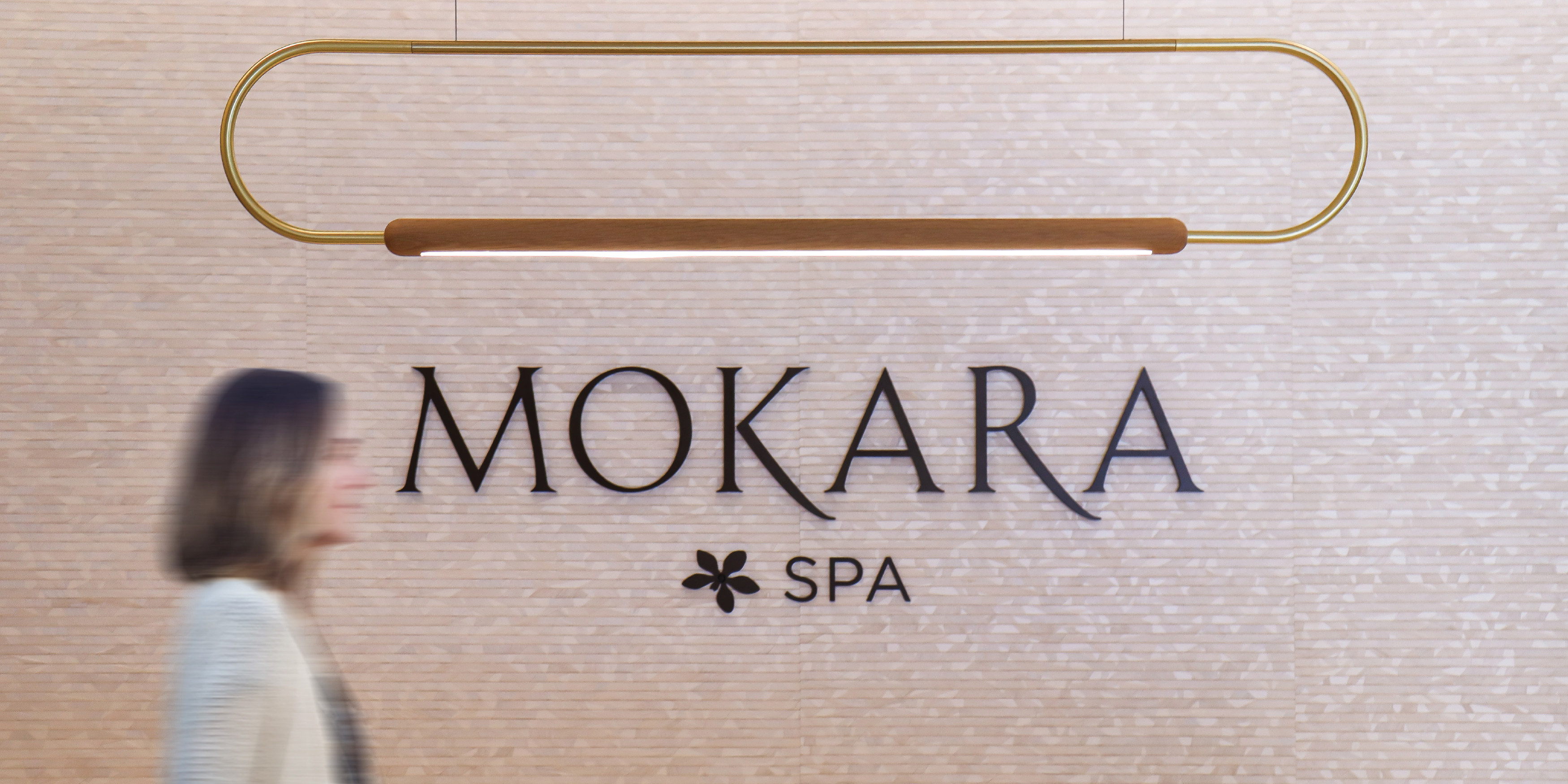 Image of the signage at Mokara Spa at the Omni PGA Frisco Resort. 